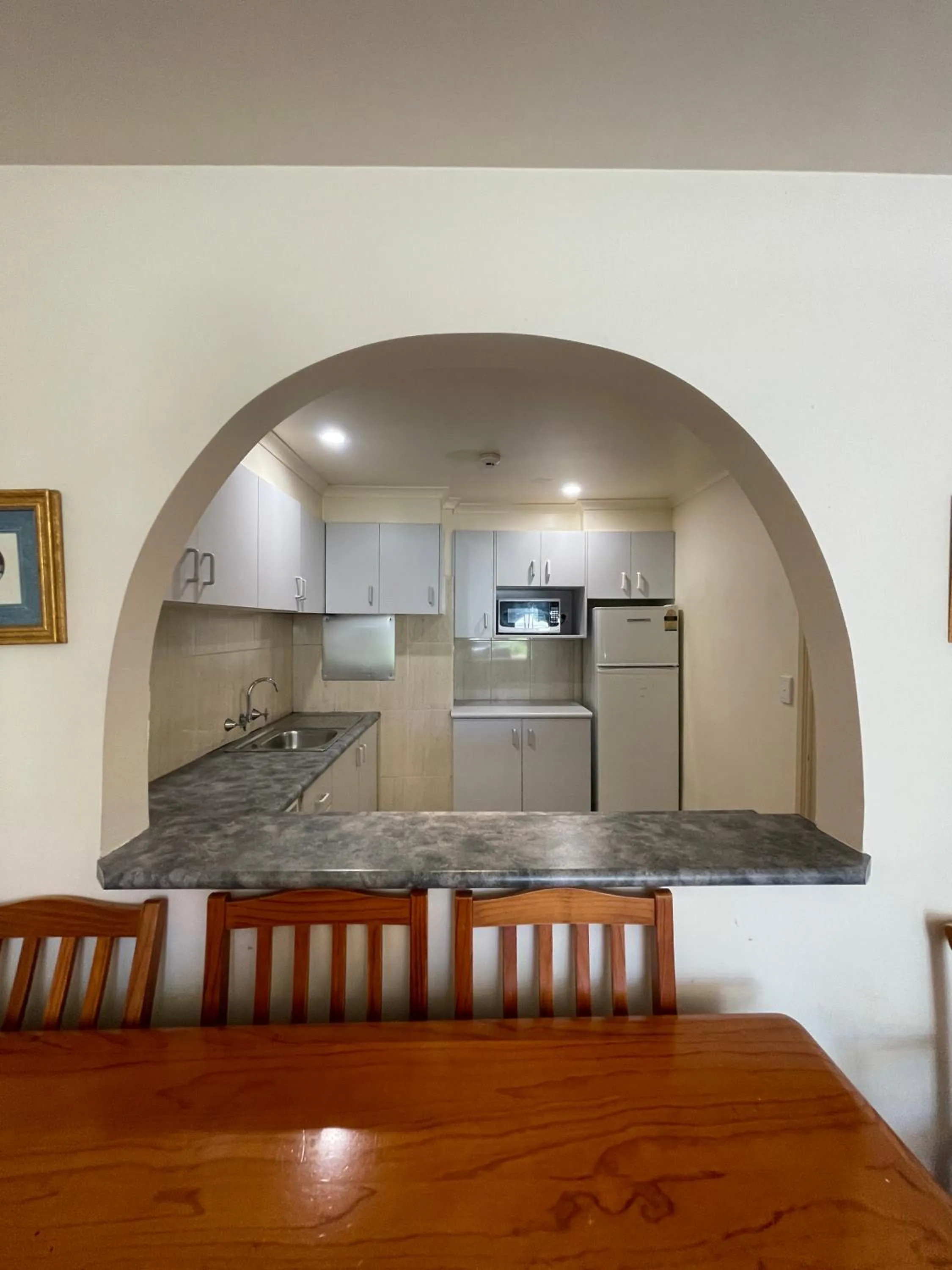 Kitchen or kitchenette in El Lago Waters Hotel