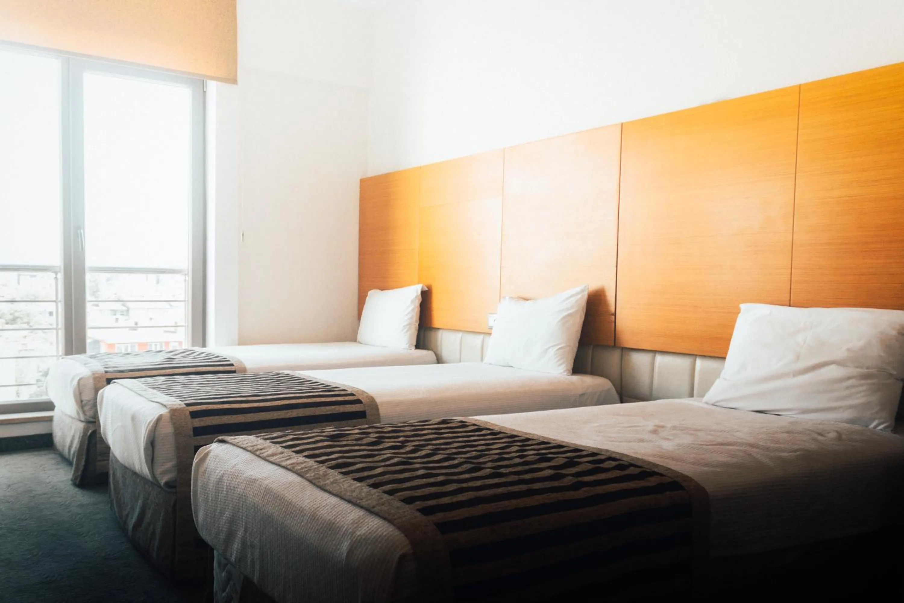 Bed in Nüzhet Hotel