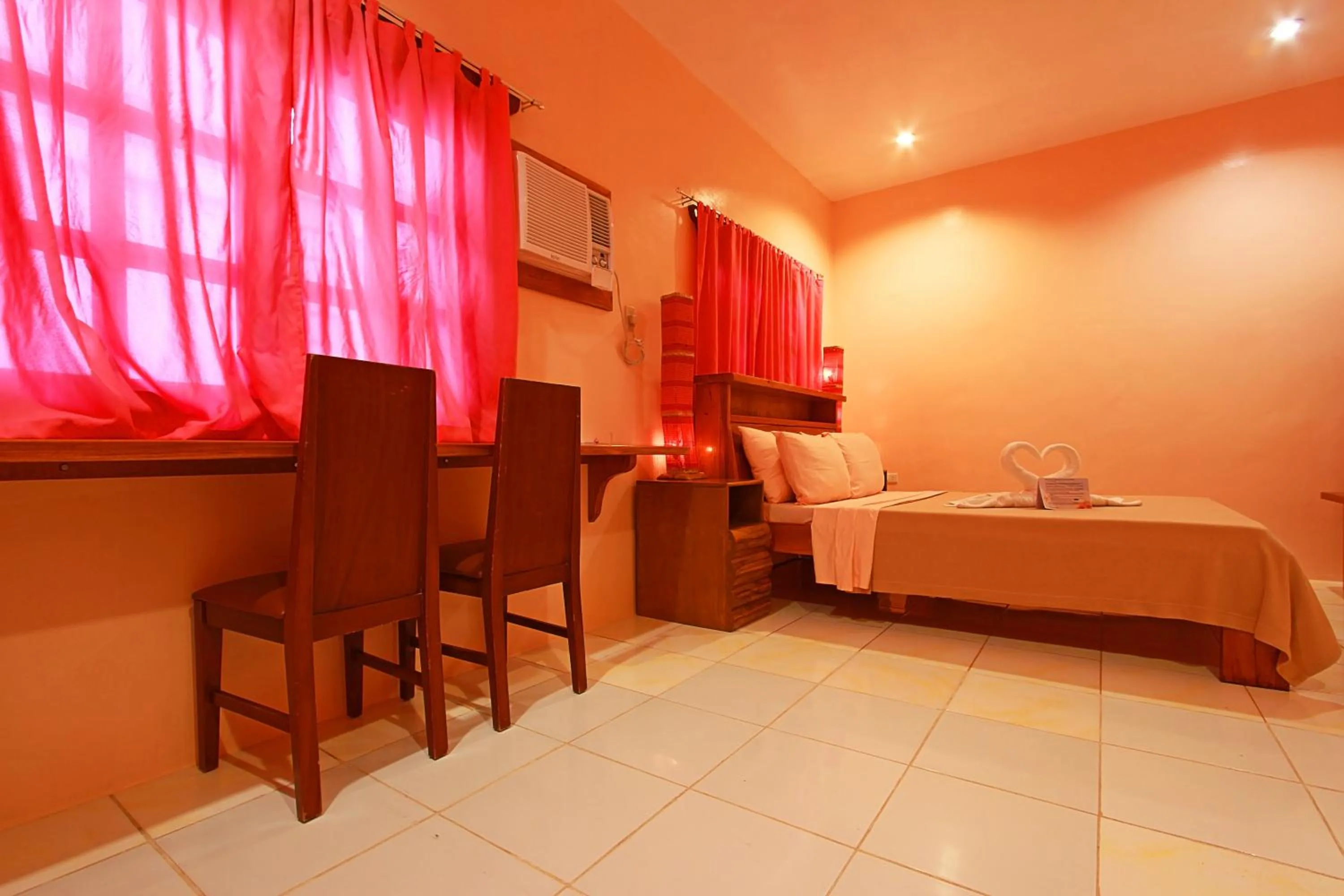 Bed in Nigi Nigi Too Beach Resort