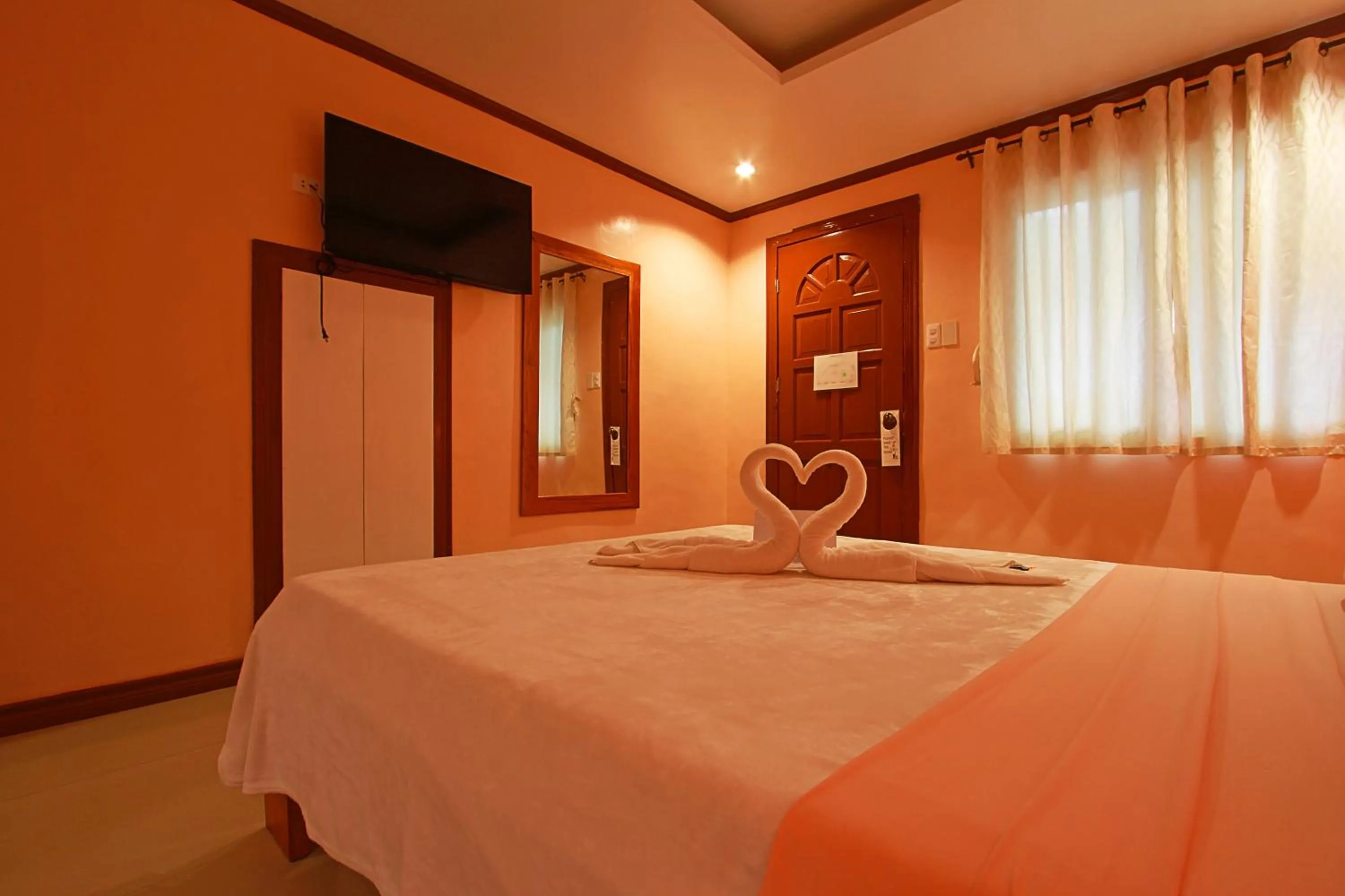 Bed in Nigi Nigi Too Beach Resort