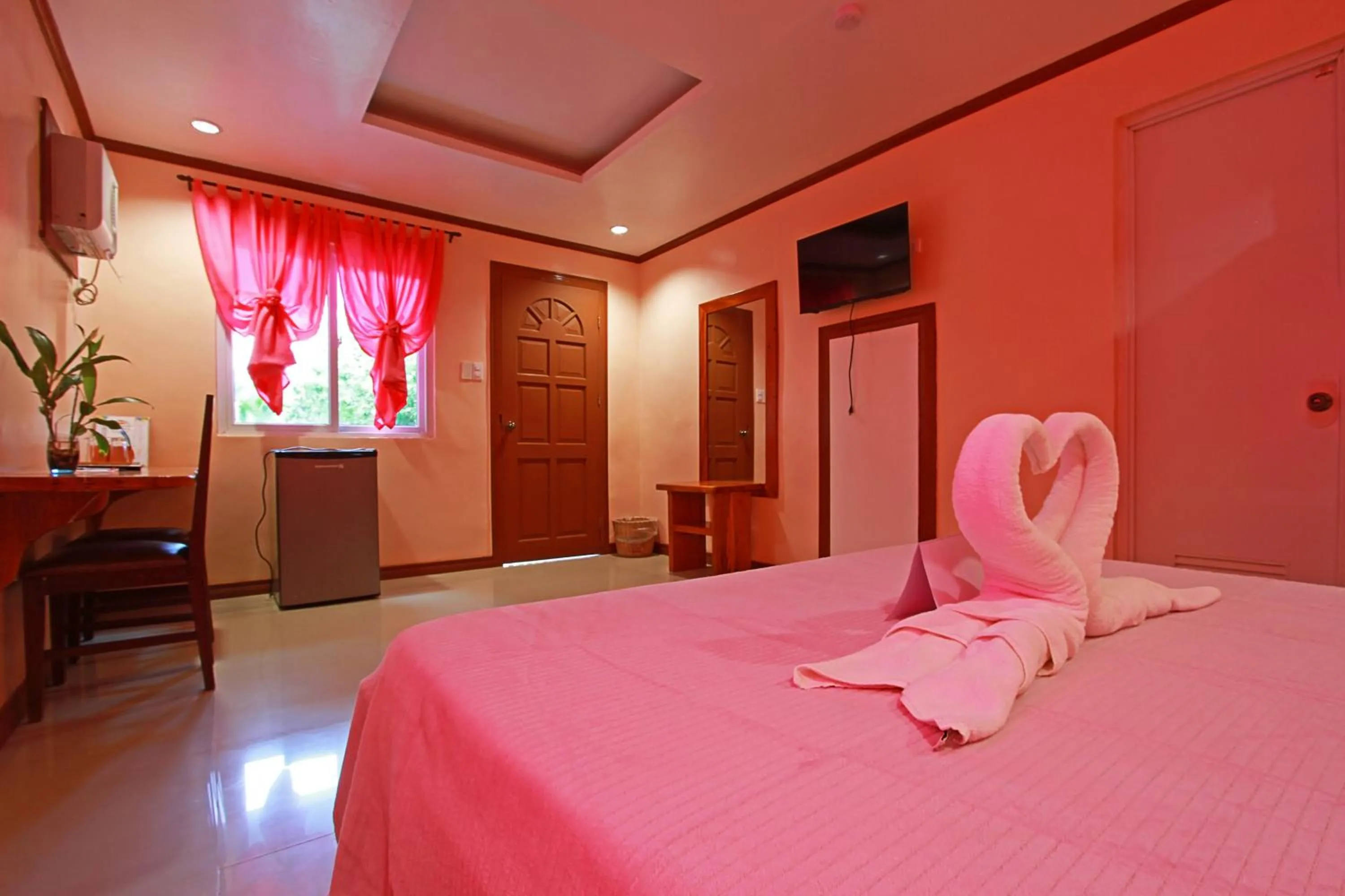 Bed in Nigi Nigi Too Beach Resort