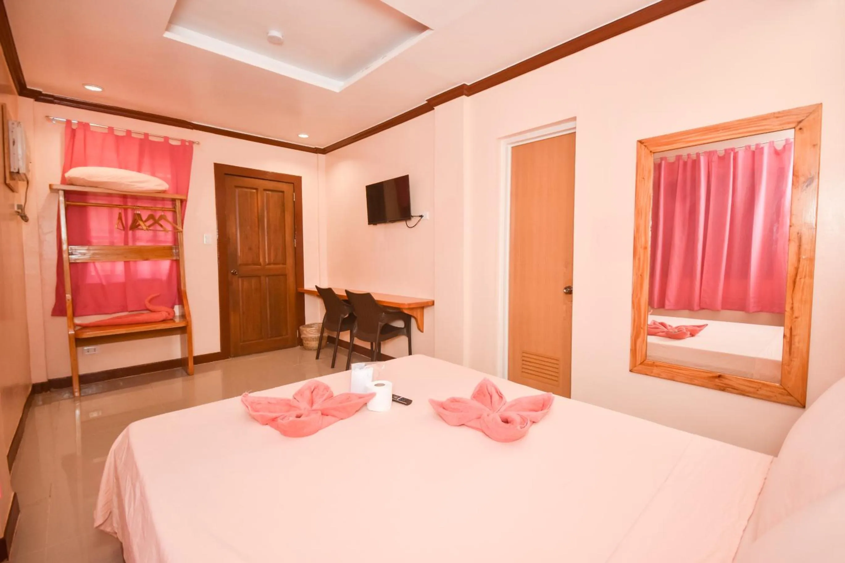 Bed in Nigi Nigi Too Beach Resort