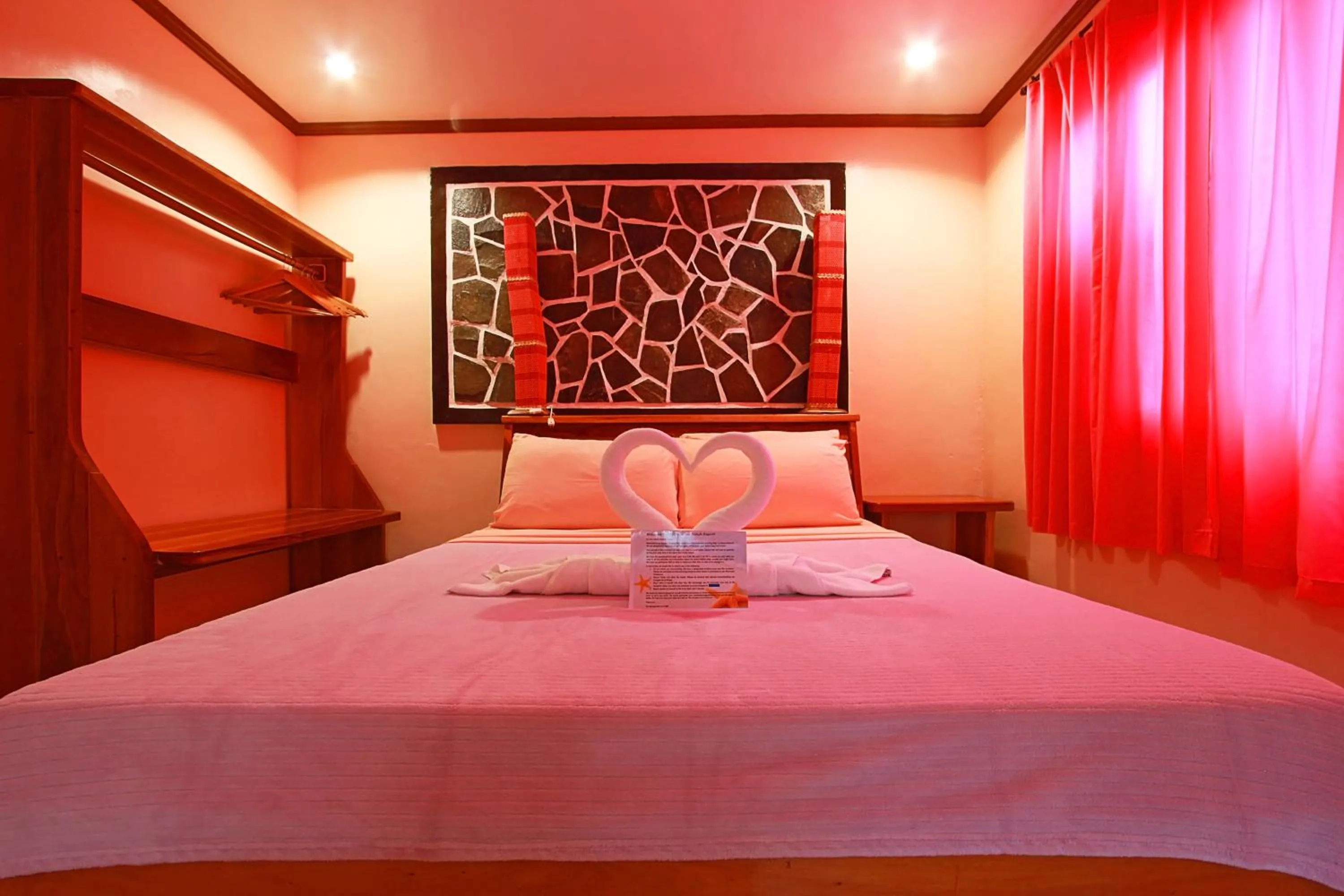 Bed in Nigi Nigi Too Beach Resort