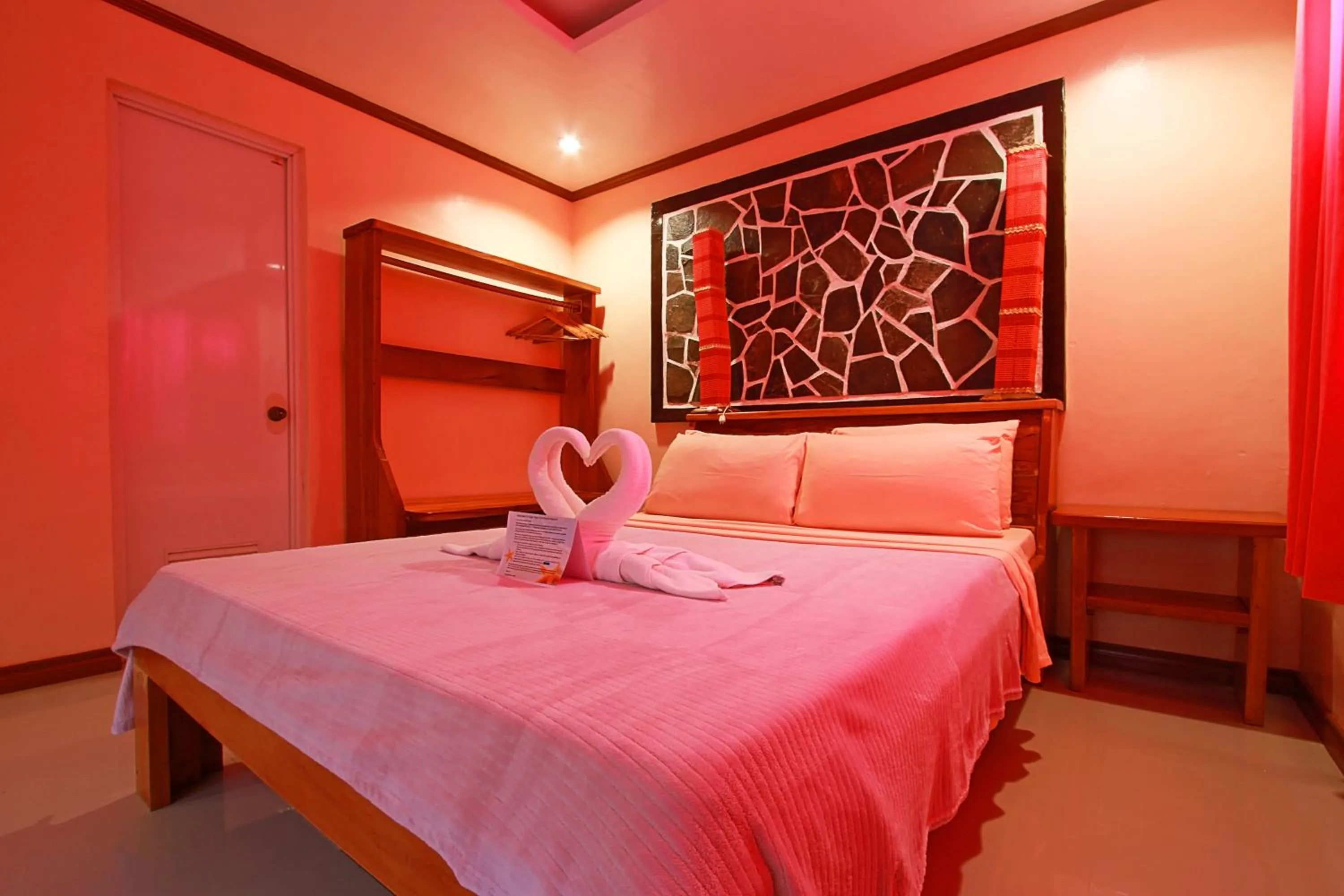 Bed in Nigi Nigi Too Beach Resort