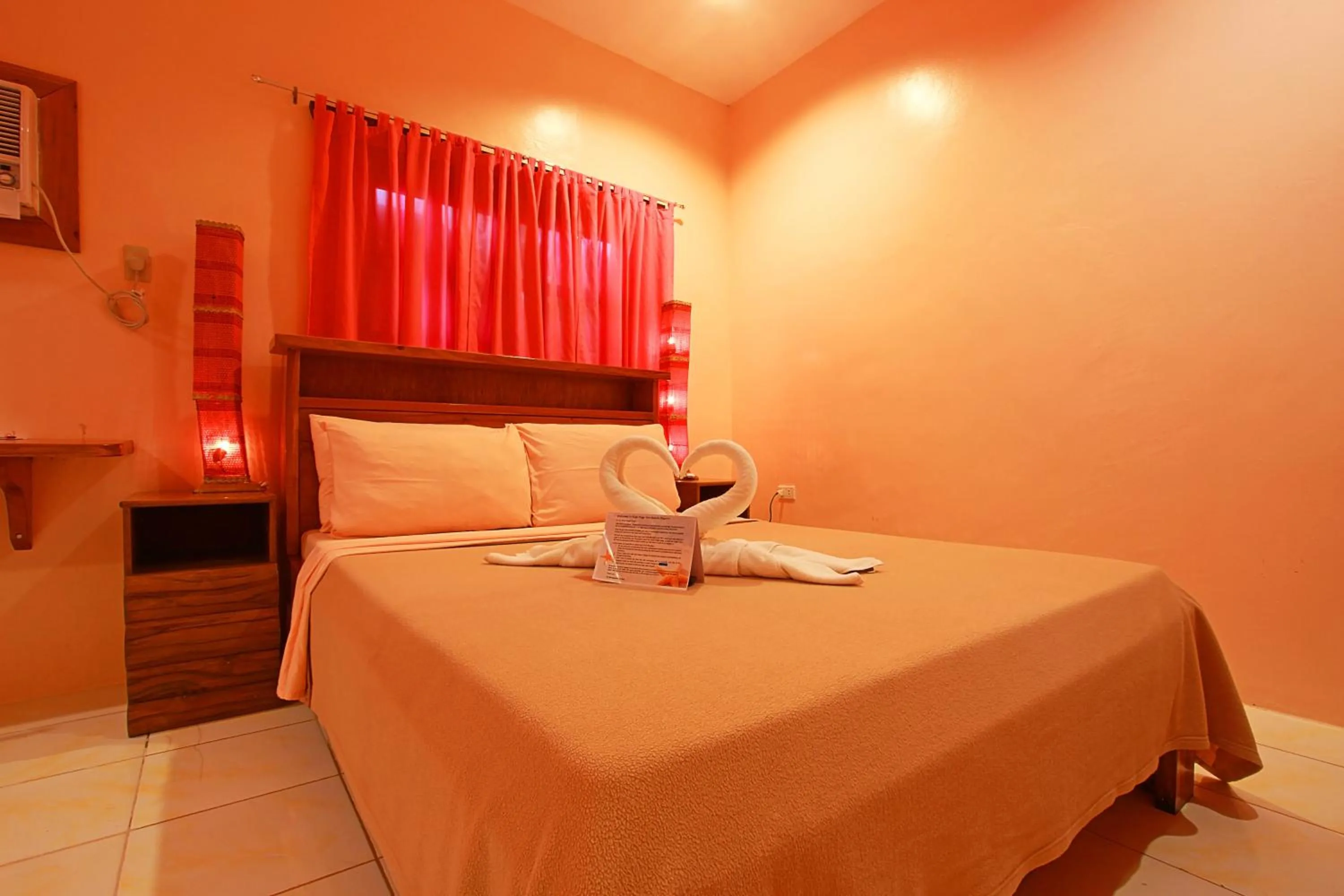 Bed in Nigi Nigi Too Beach Resort