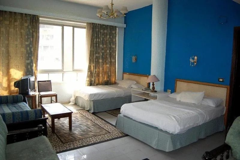 Bed in Nile Zamalek Hotel