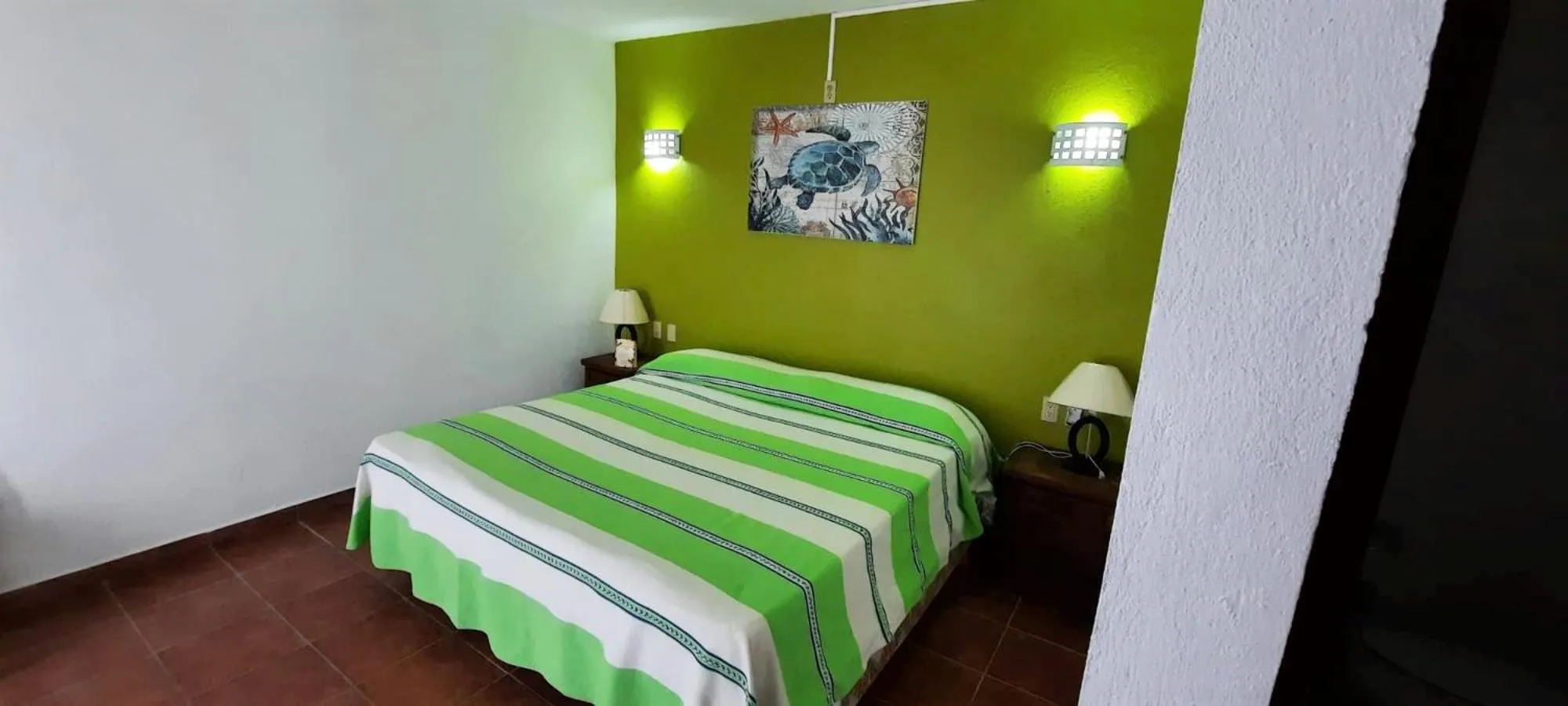 Bed in La Vivienda Villa