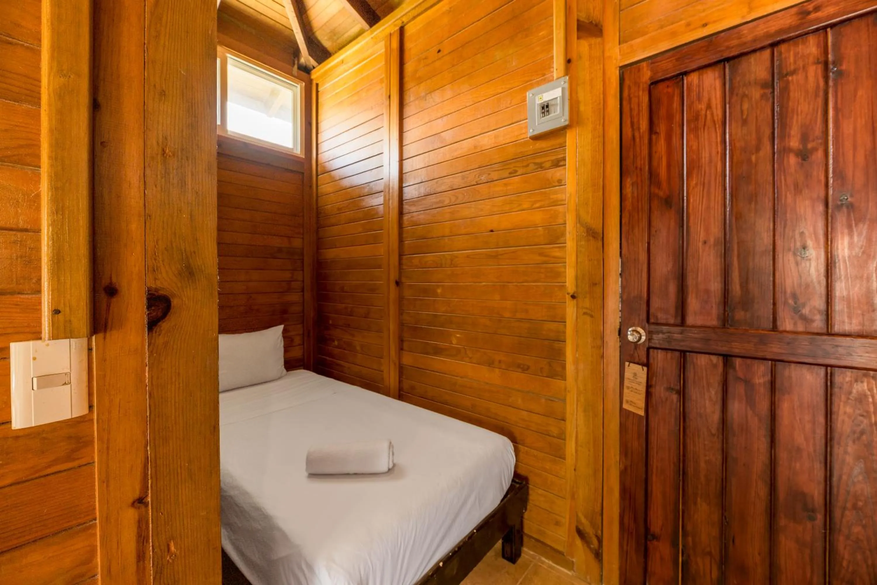 Bed in Tekio Beach Hotel