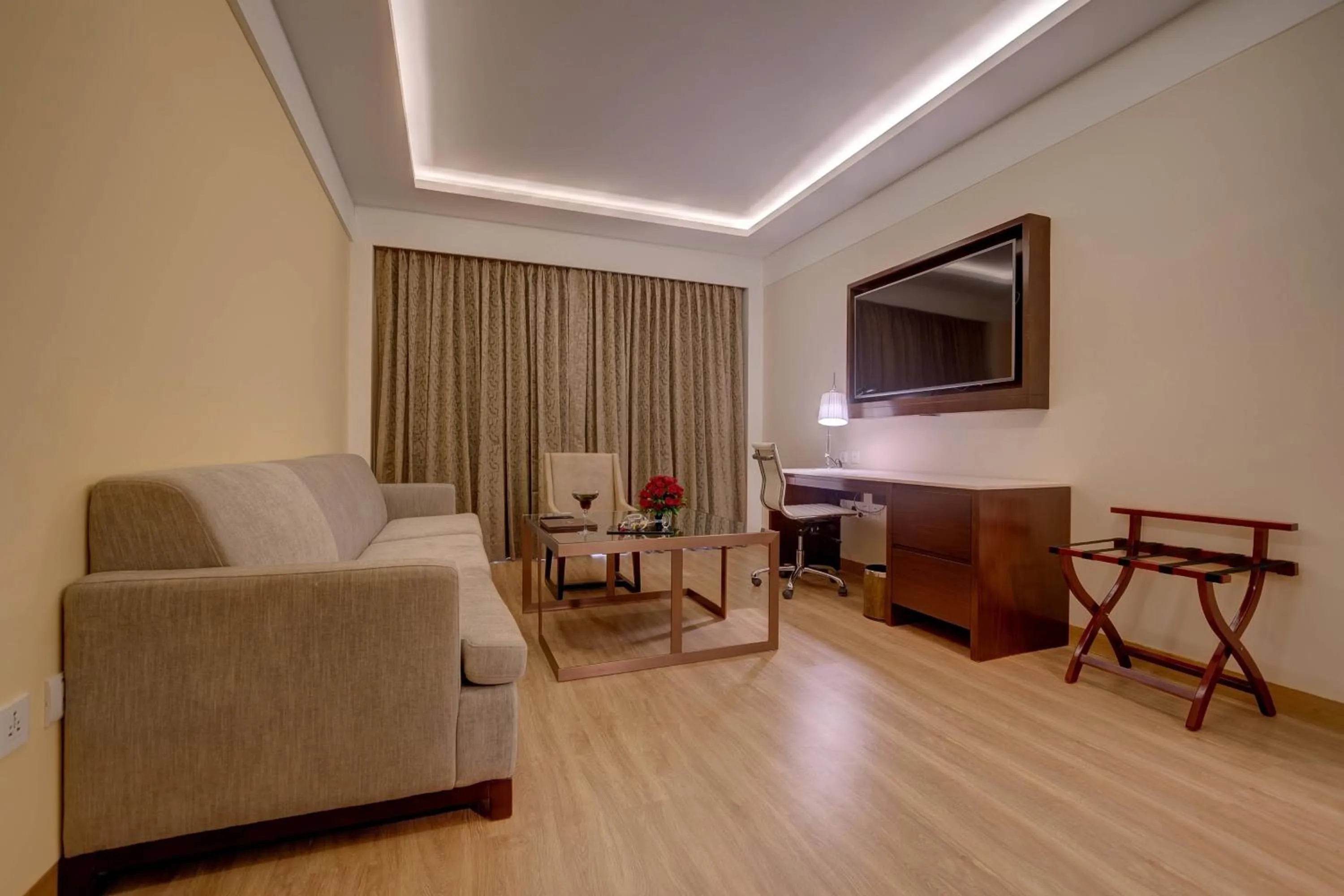 Living room in Courtyard by Marriott Surat