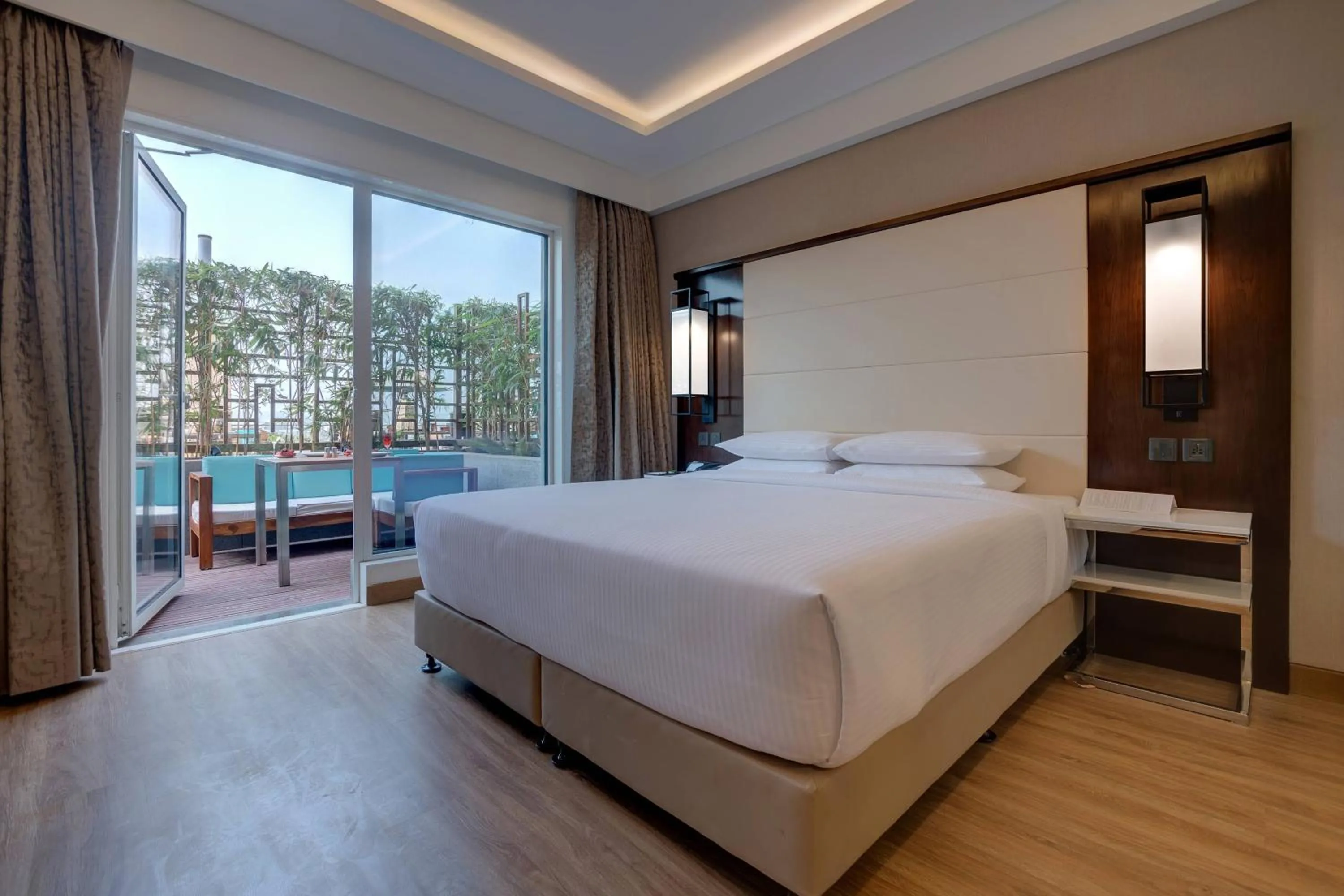 Photo of the whole room, Bed in Courtyard by Marriott Surat