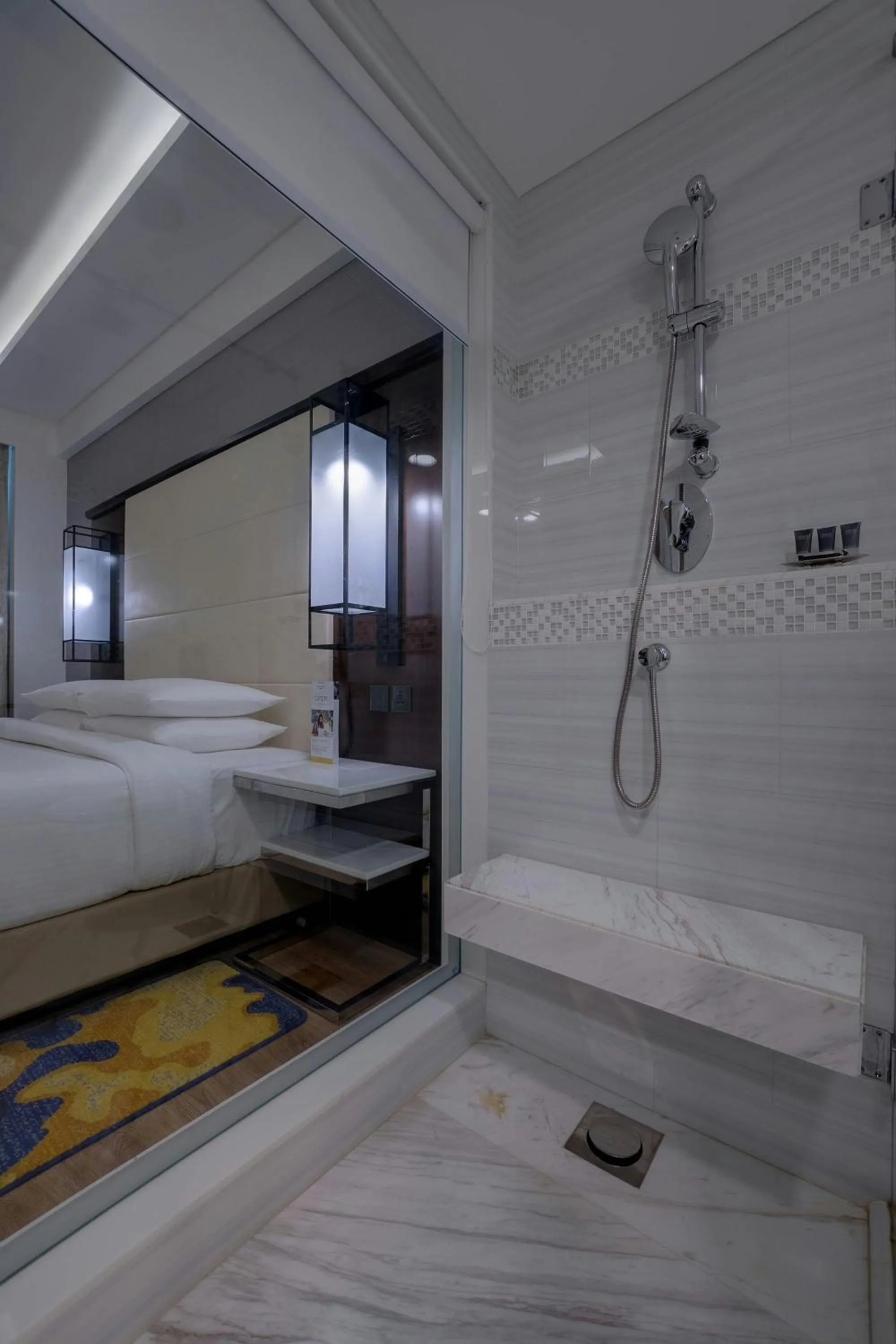 Bathroom, Bed in Courtyard by Marriott Surat