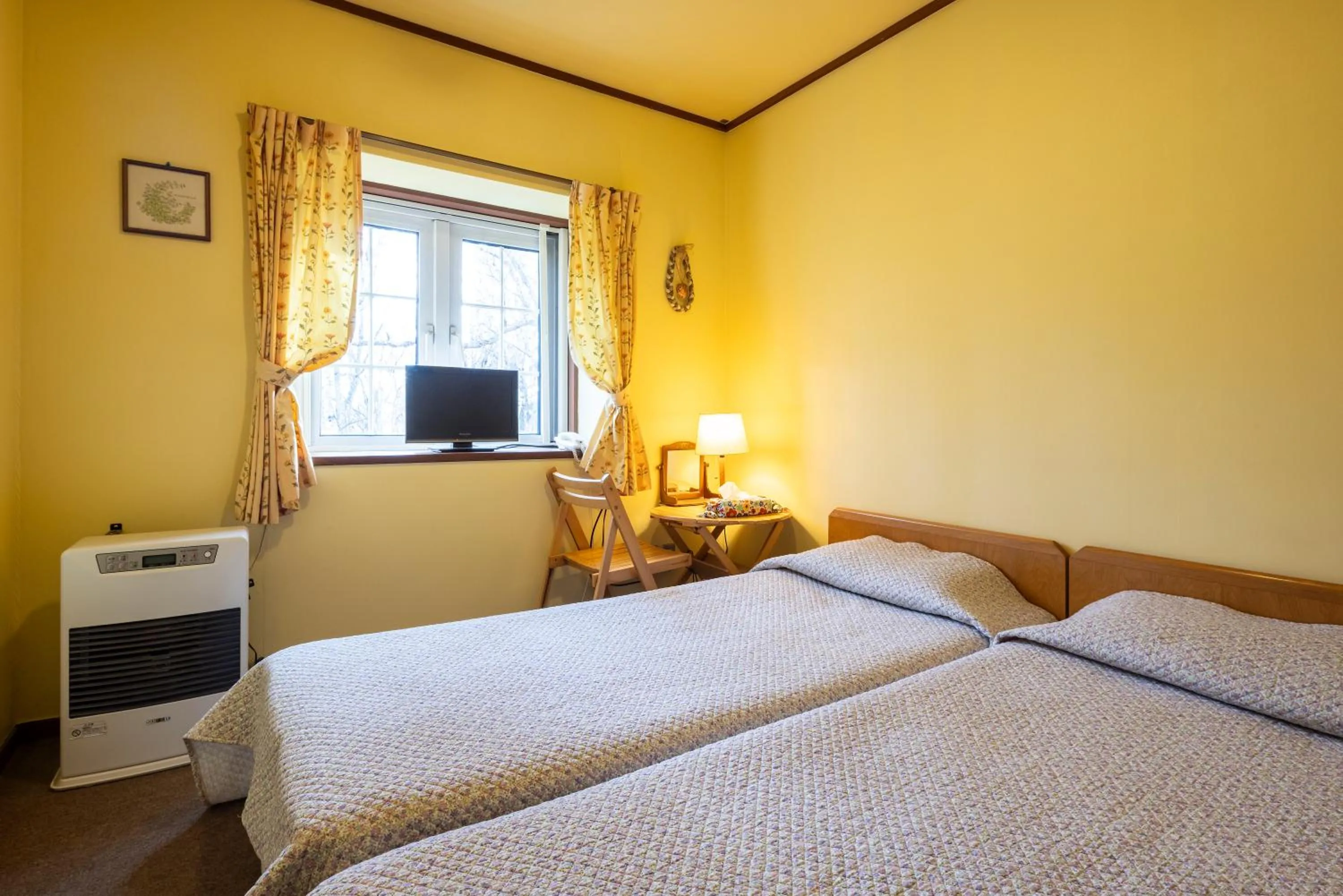 Bed in Pension Rapport in Tambara Plateau