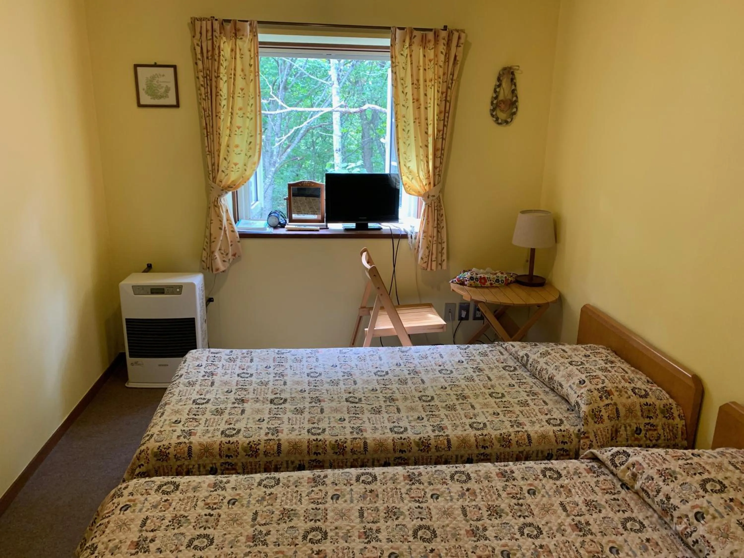 Photo of the whole room, Bed in Pension Rapport in Tambara Plateau