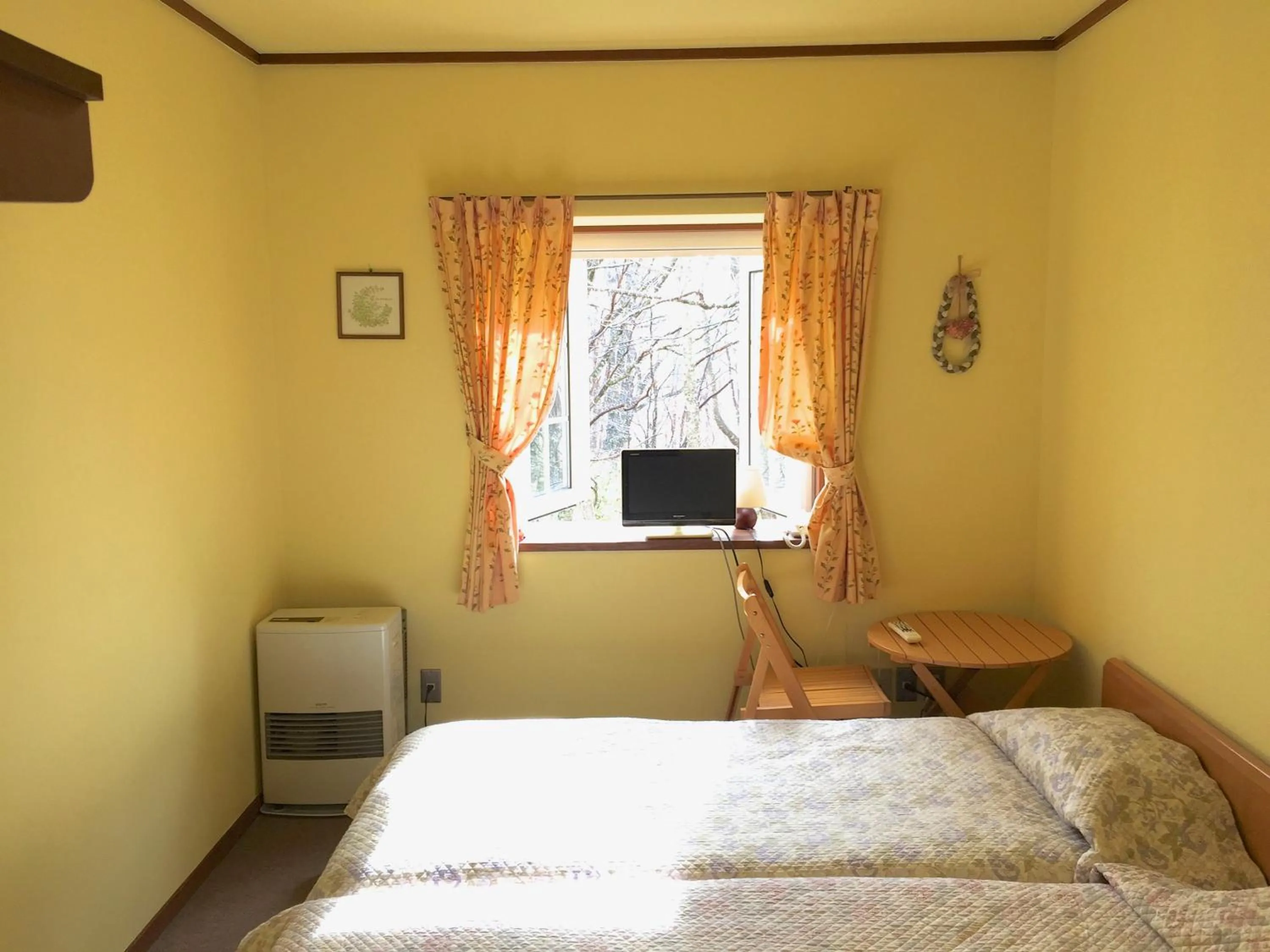 Photo of the whole room, Bed in Pension Rapport in Tambara Plateau