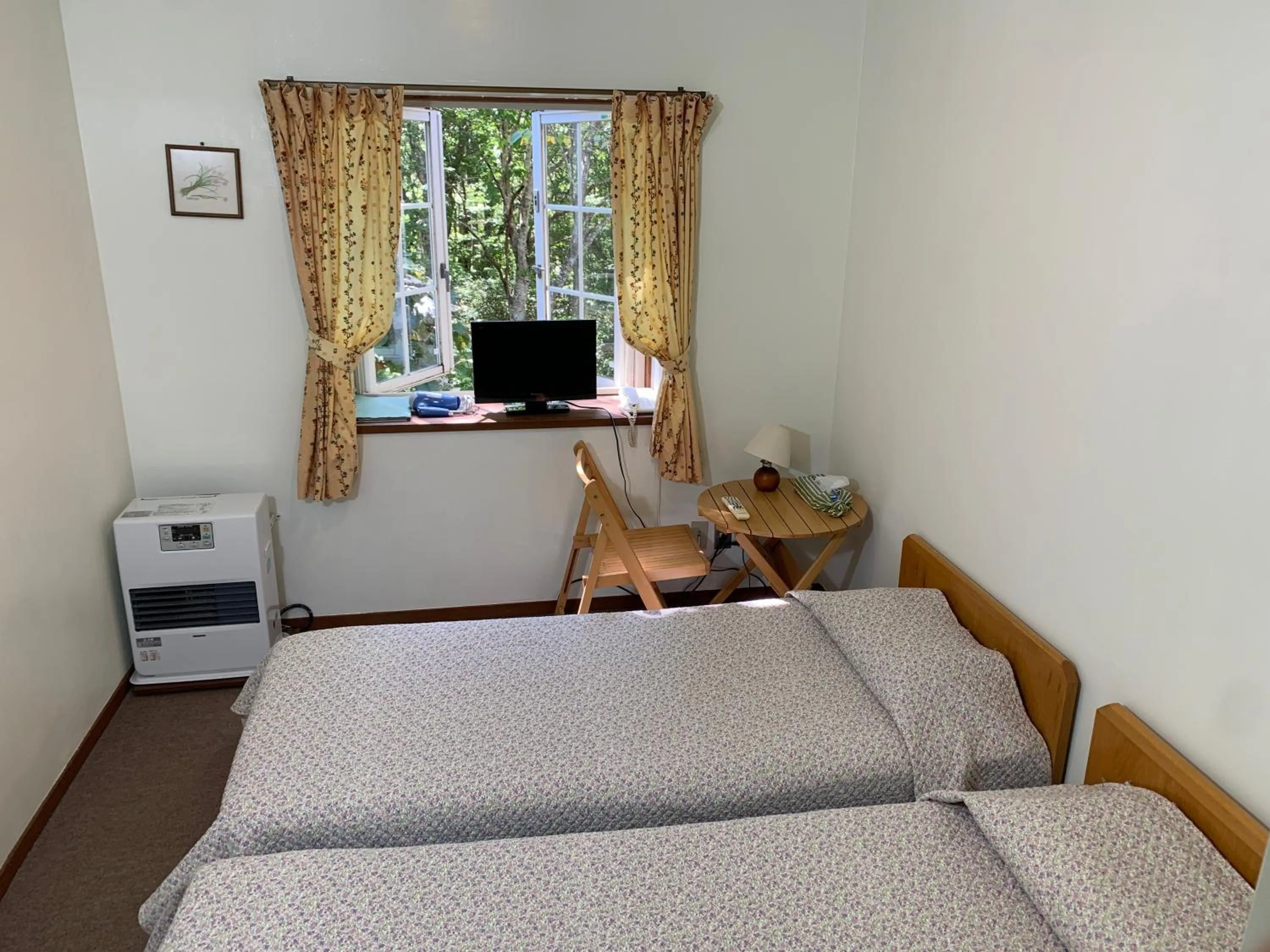 Photo of the whole room, Bed in Pension Rapport in Tambara Plateau