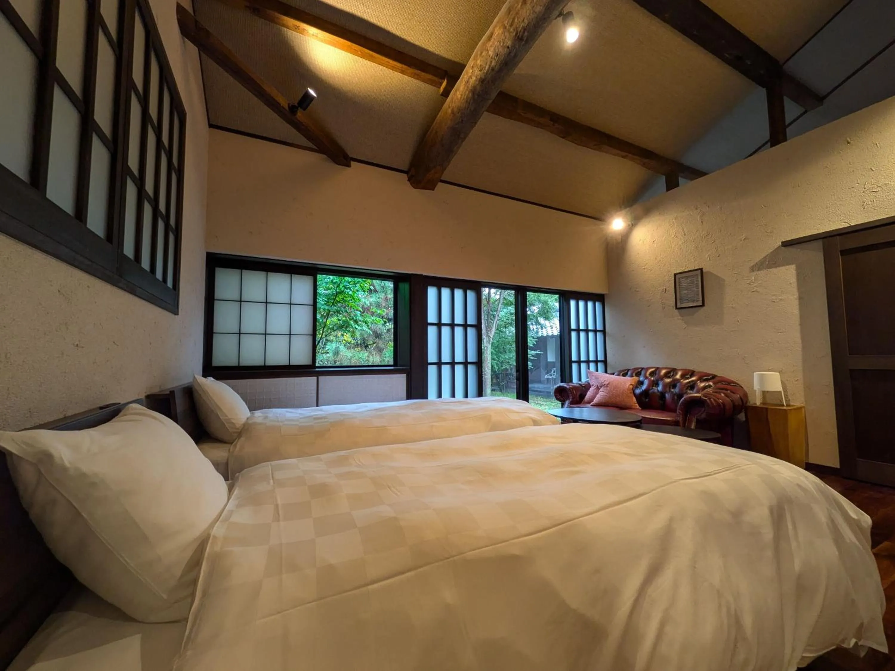 Bed in Machiya Hotel oyado baison