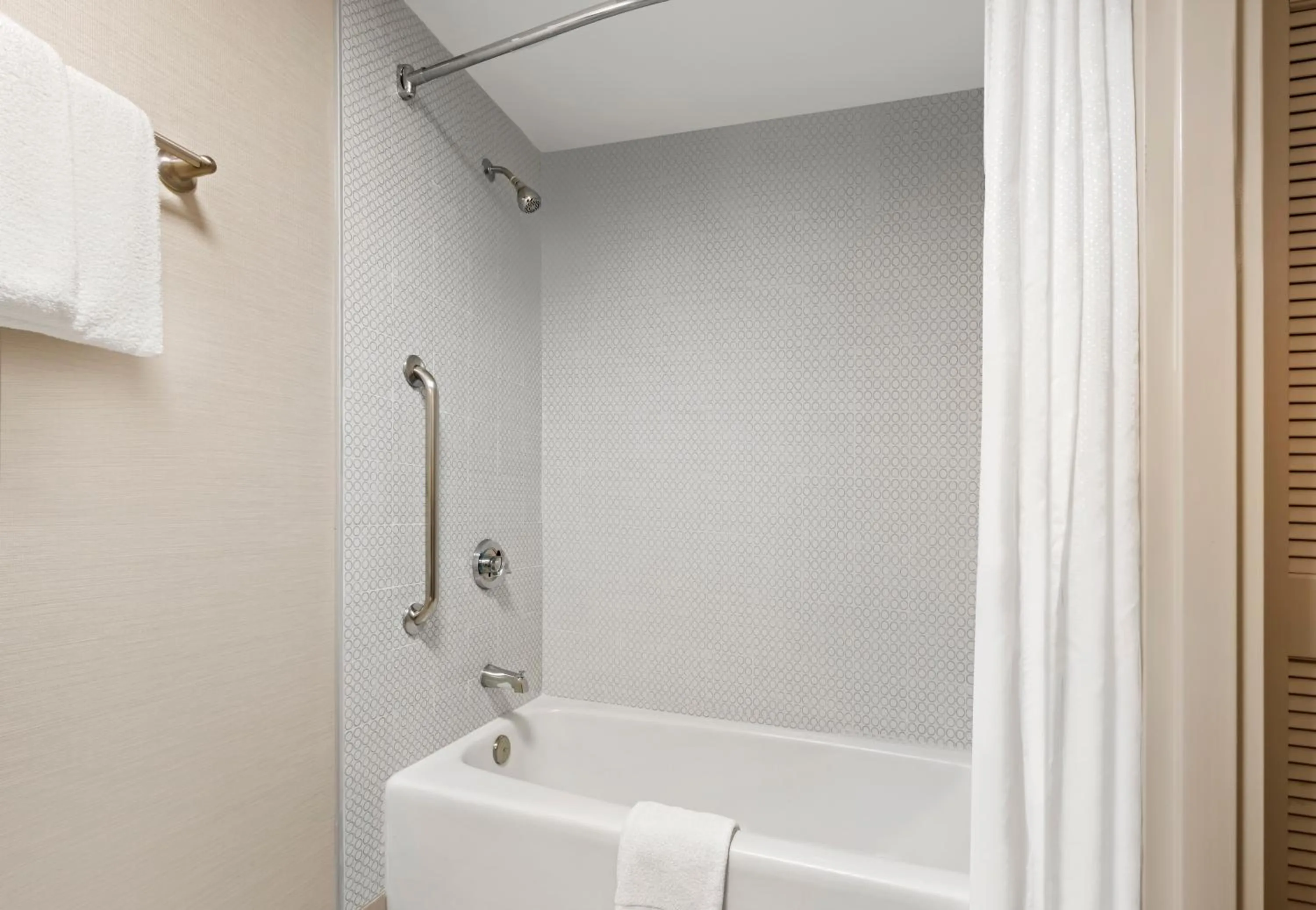 Bathroom in Super 8 by Wyndham Dallas Love Field Airport