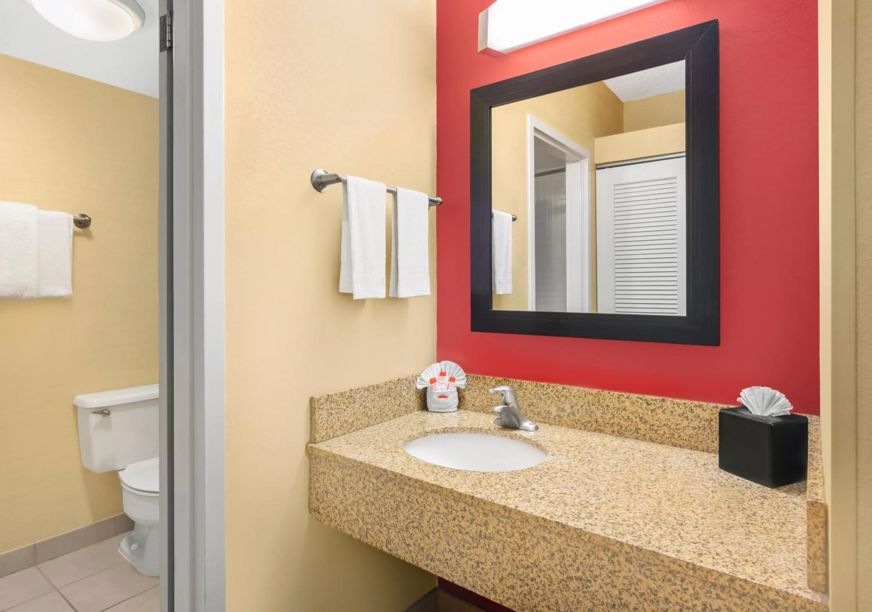 Bathroom in Super 8 by Wyndham Dallas Love Field Airport