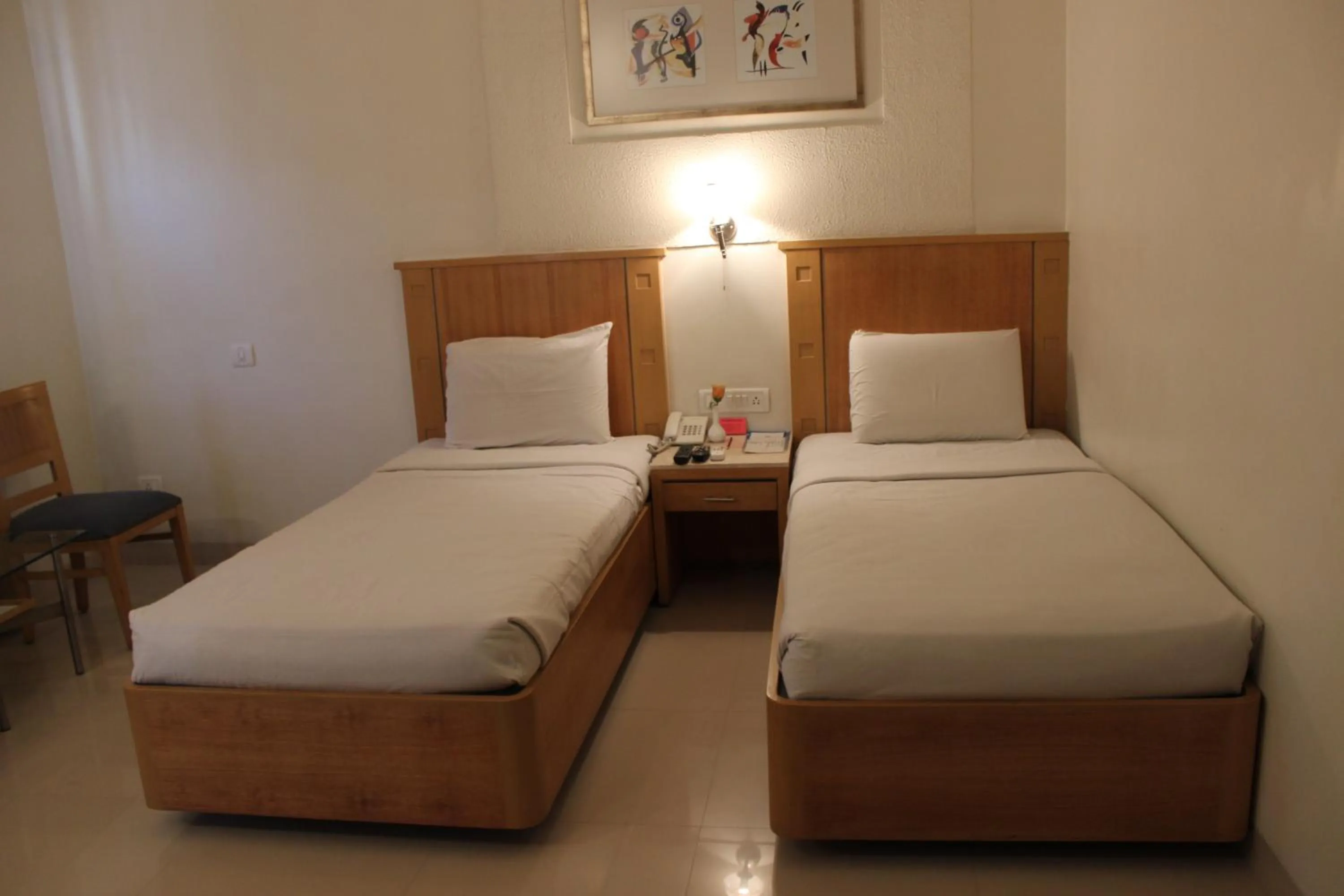 Bed in Hotel Stay Inn