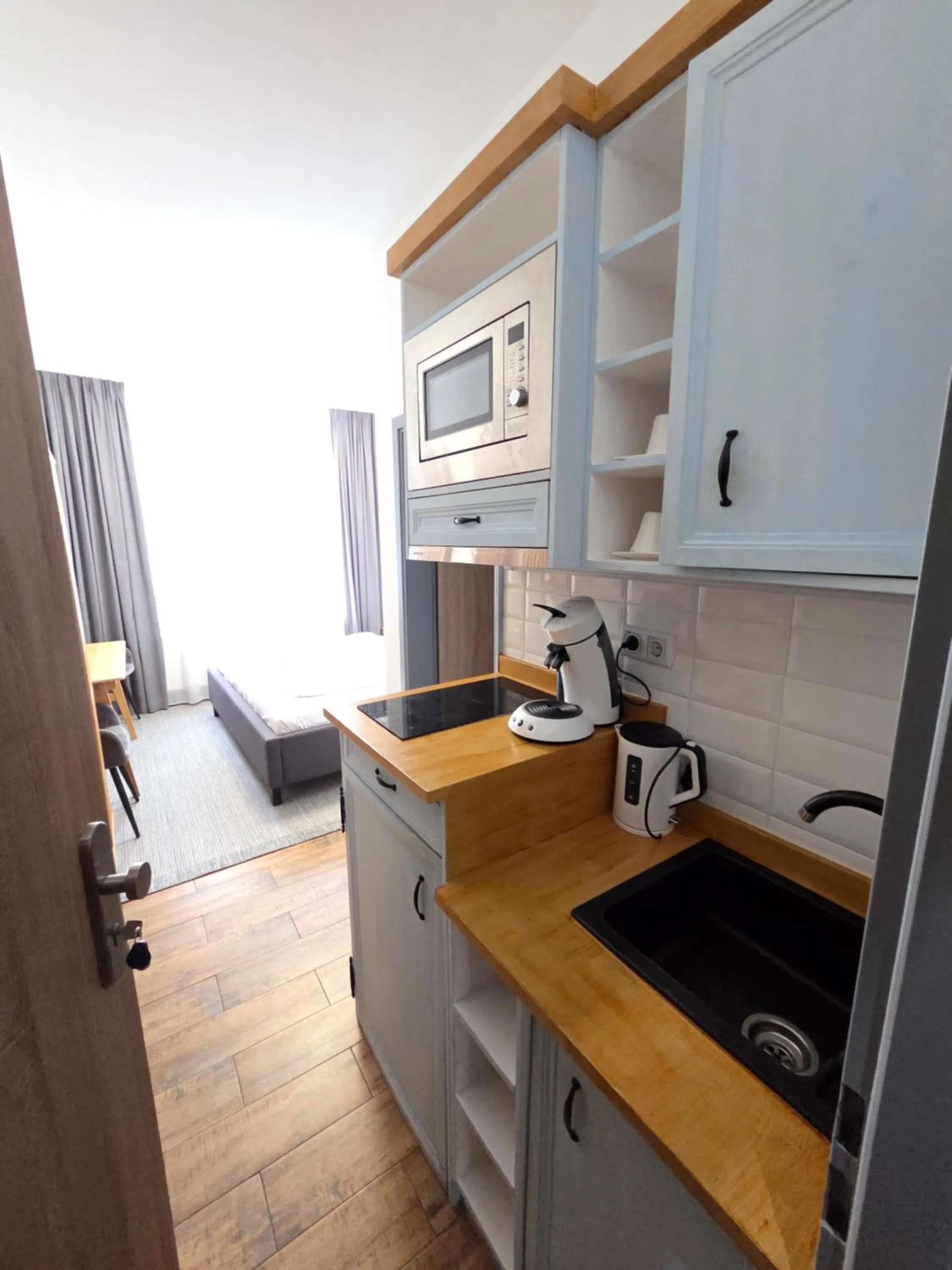 Kitchen or kitchenette in Marcel Apartments Leipzig