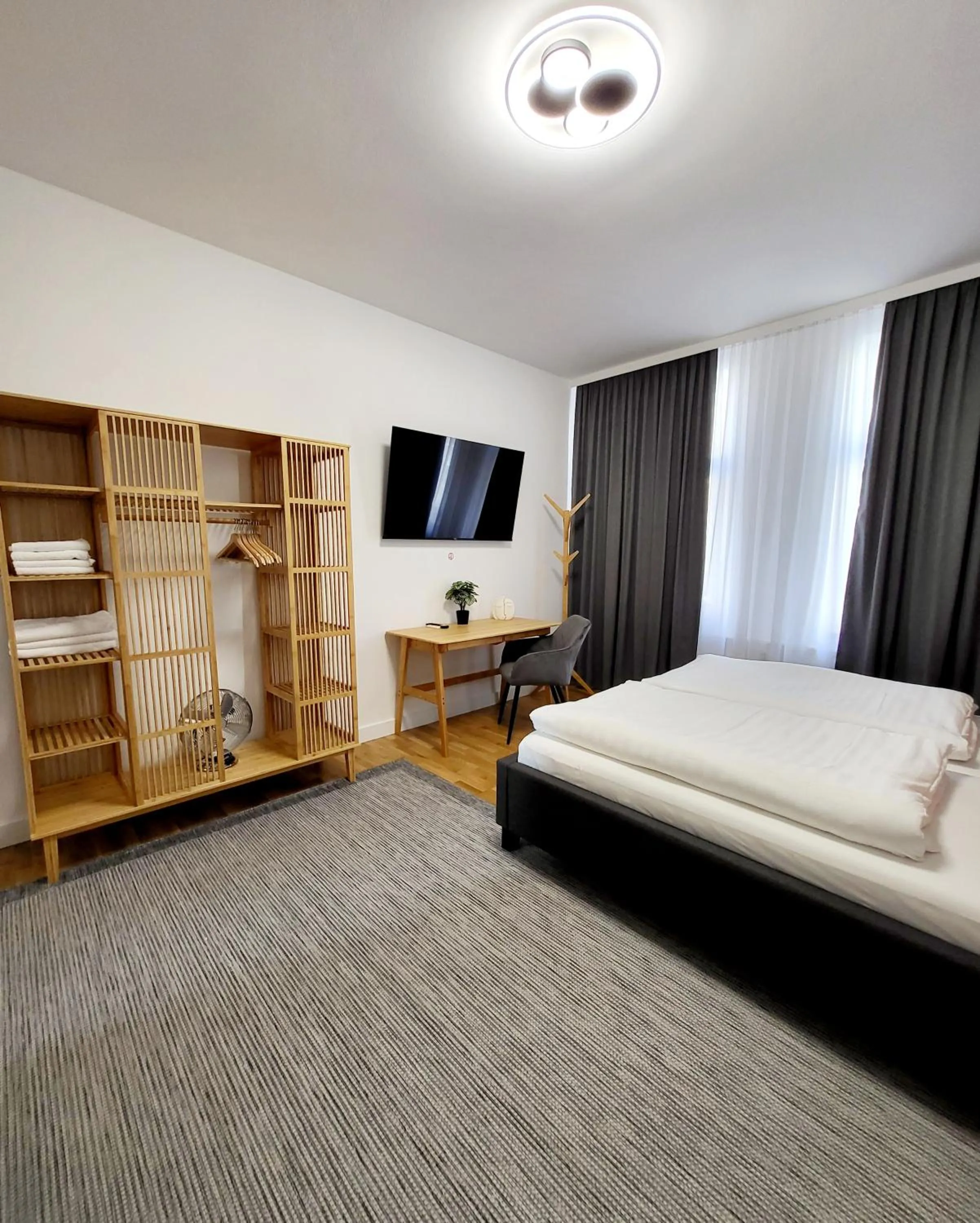 Photo of the whole room, Bed in Marcel Apartments Leipzig