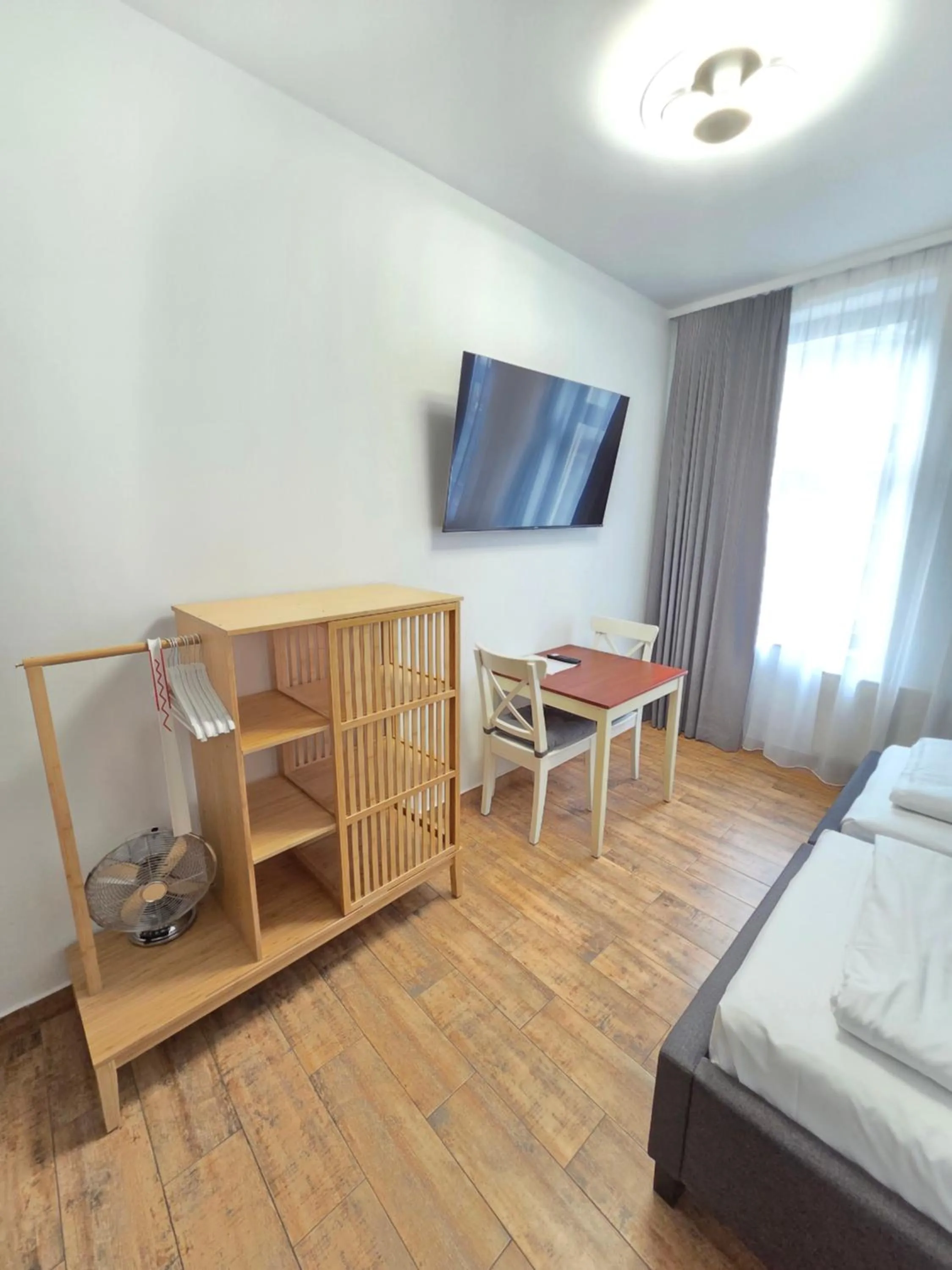 TV and multimedia, Bed in Marcel Apartments Leipzig