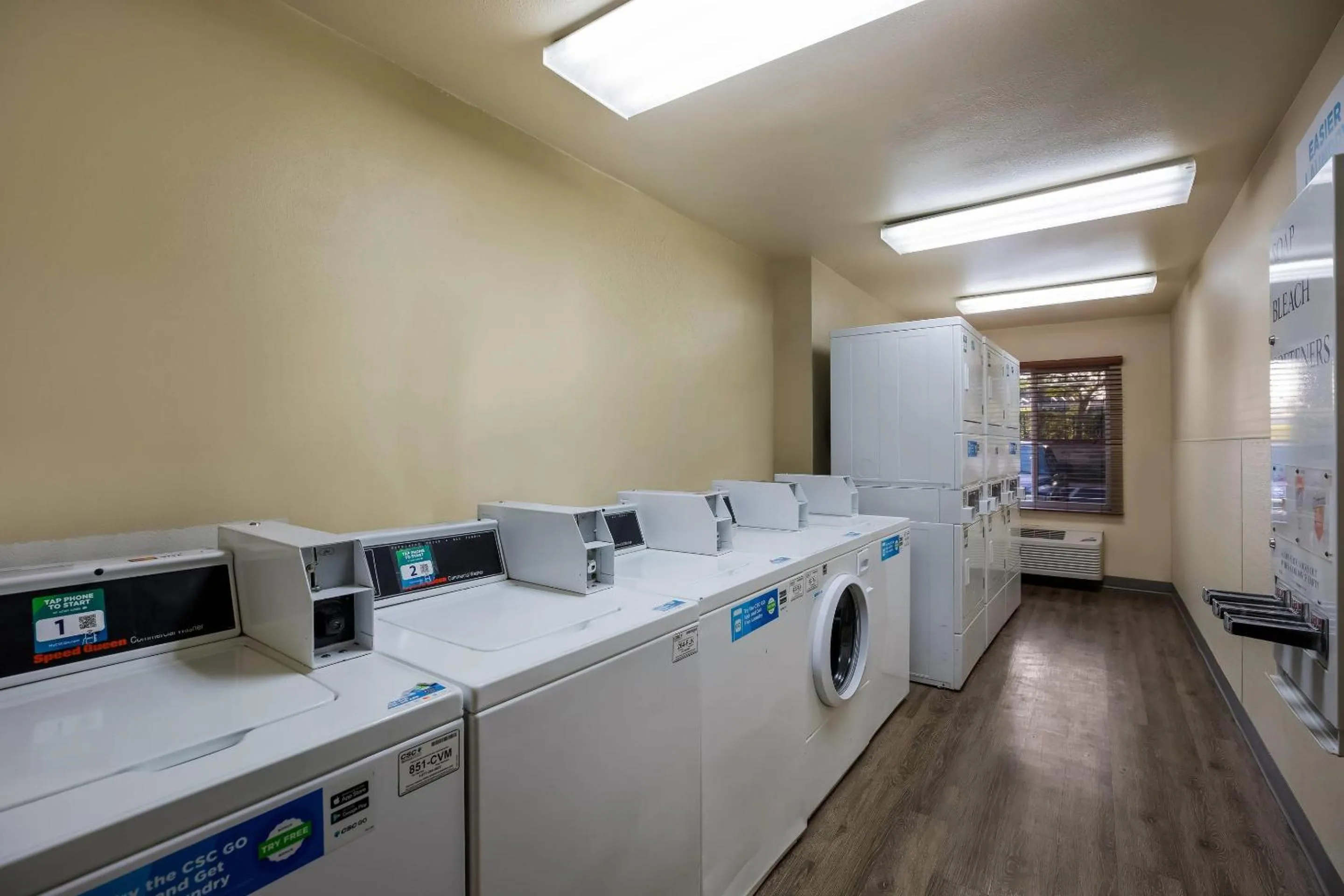 washing machine in WoodSpring Suites Orlando West - Clermont
