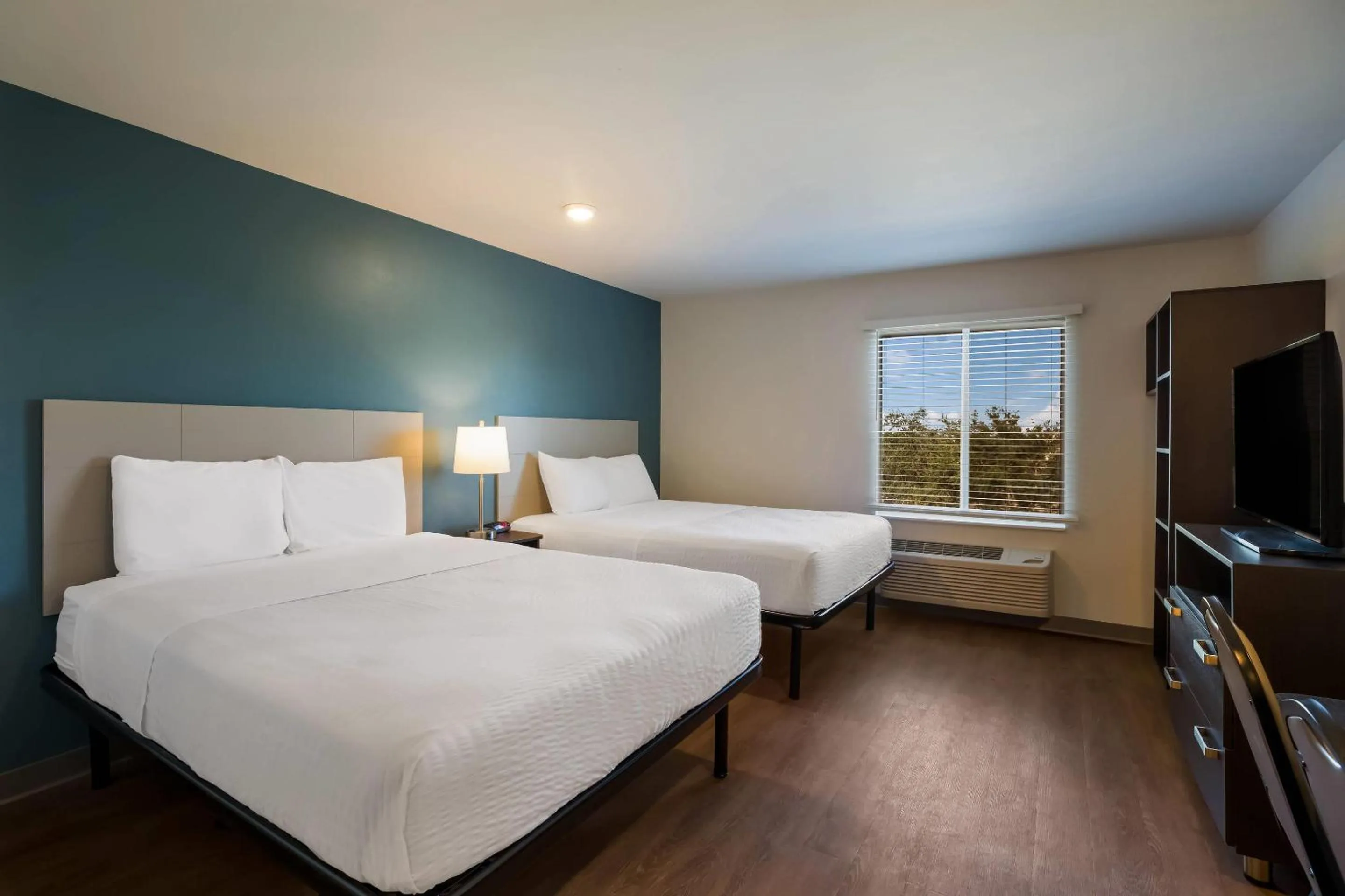 Bedroom, Bed in WoodSpring Suites Orlando West - Clermont