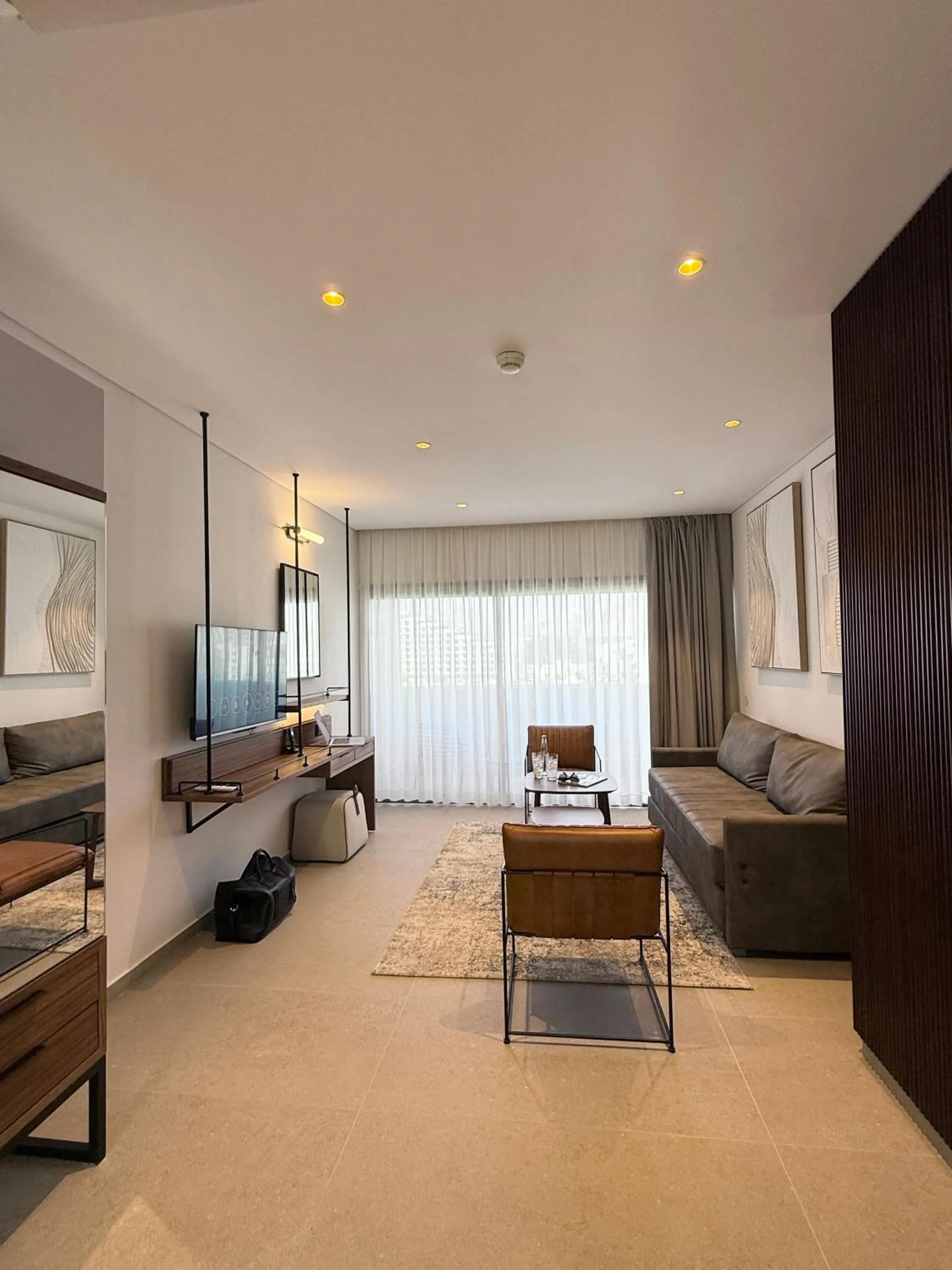 Living room, Bed in Caesar Premier Eilat Hotel