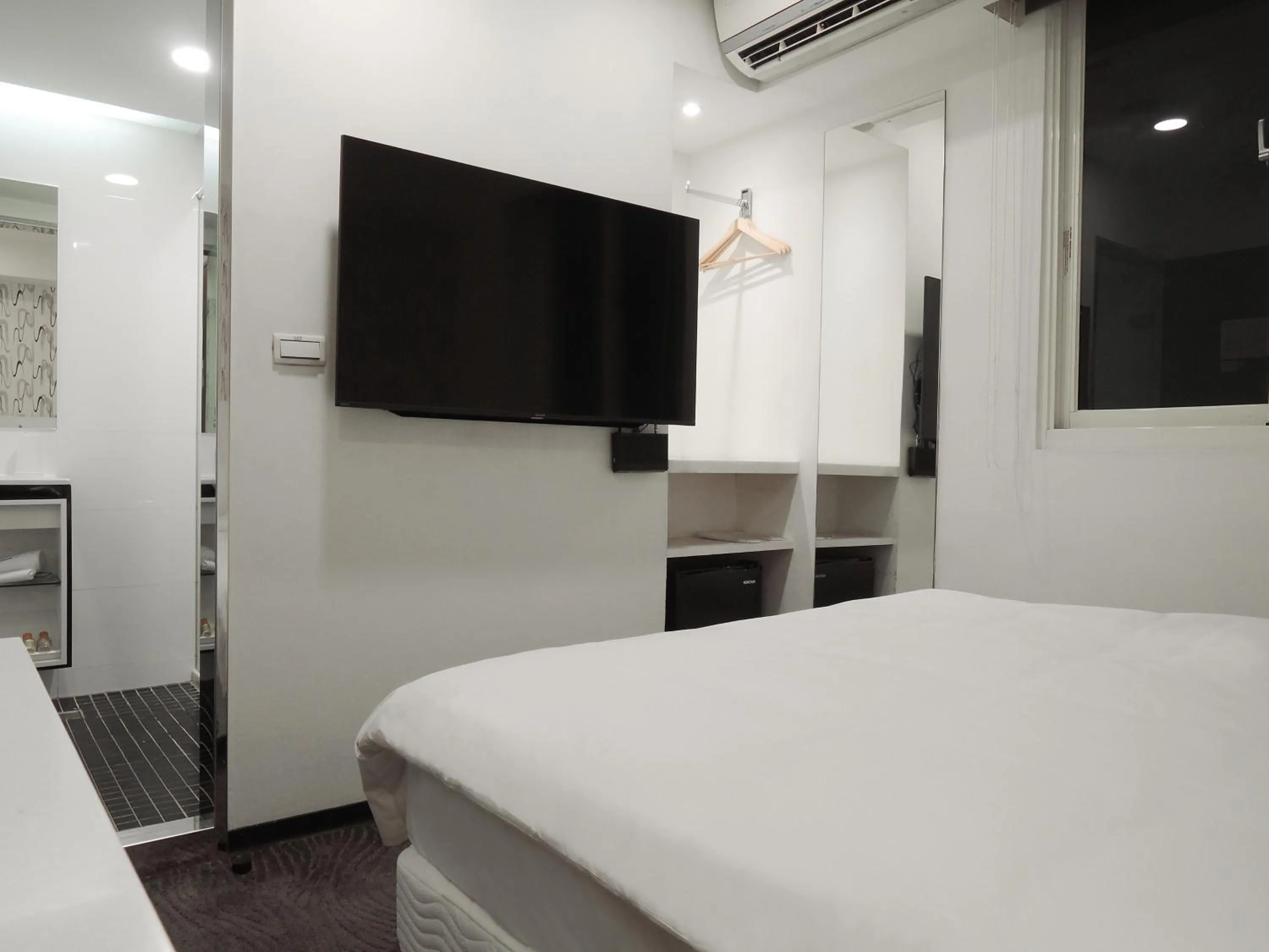 Bed in CHECK inn Express Taipei Yongkang