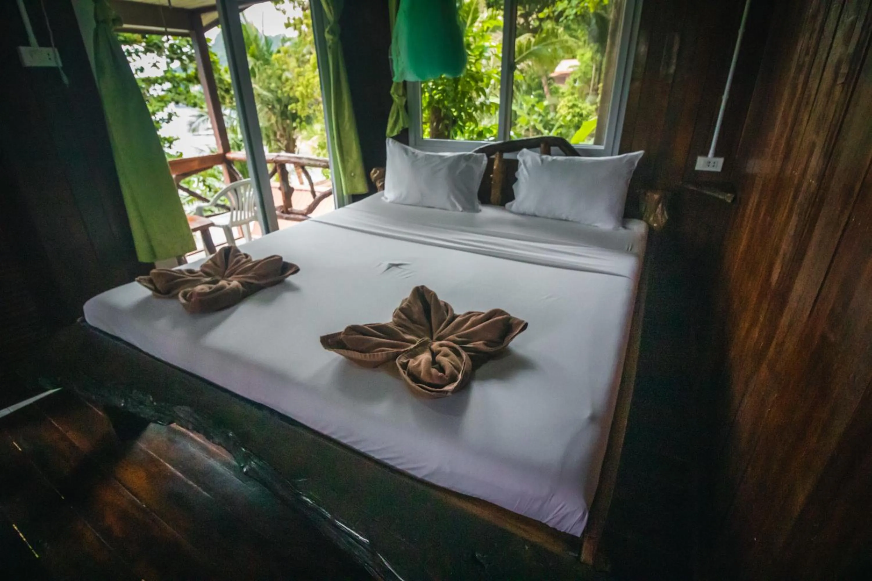 Bed in Phi Phi Sunset Bay Resort