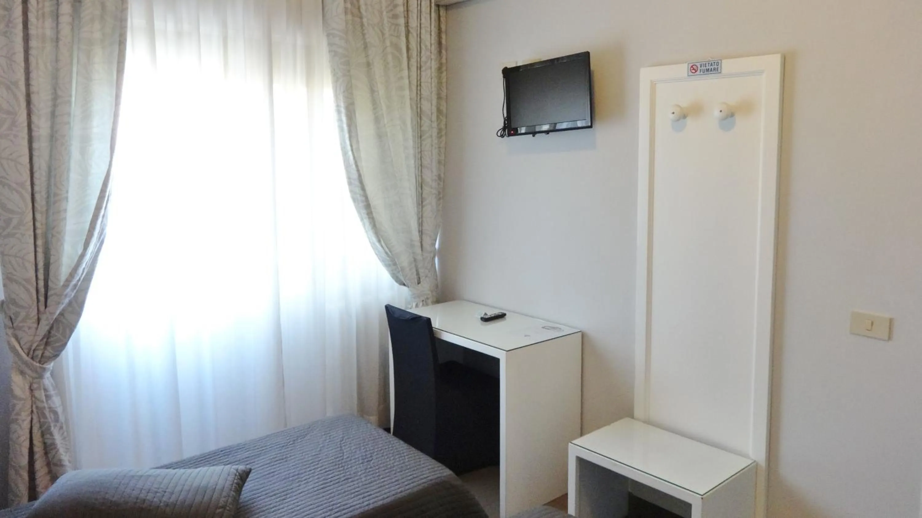 Photo of the whole room, TV/Entertainment Center in Hotel Marte