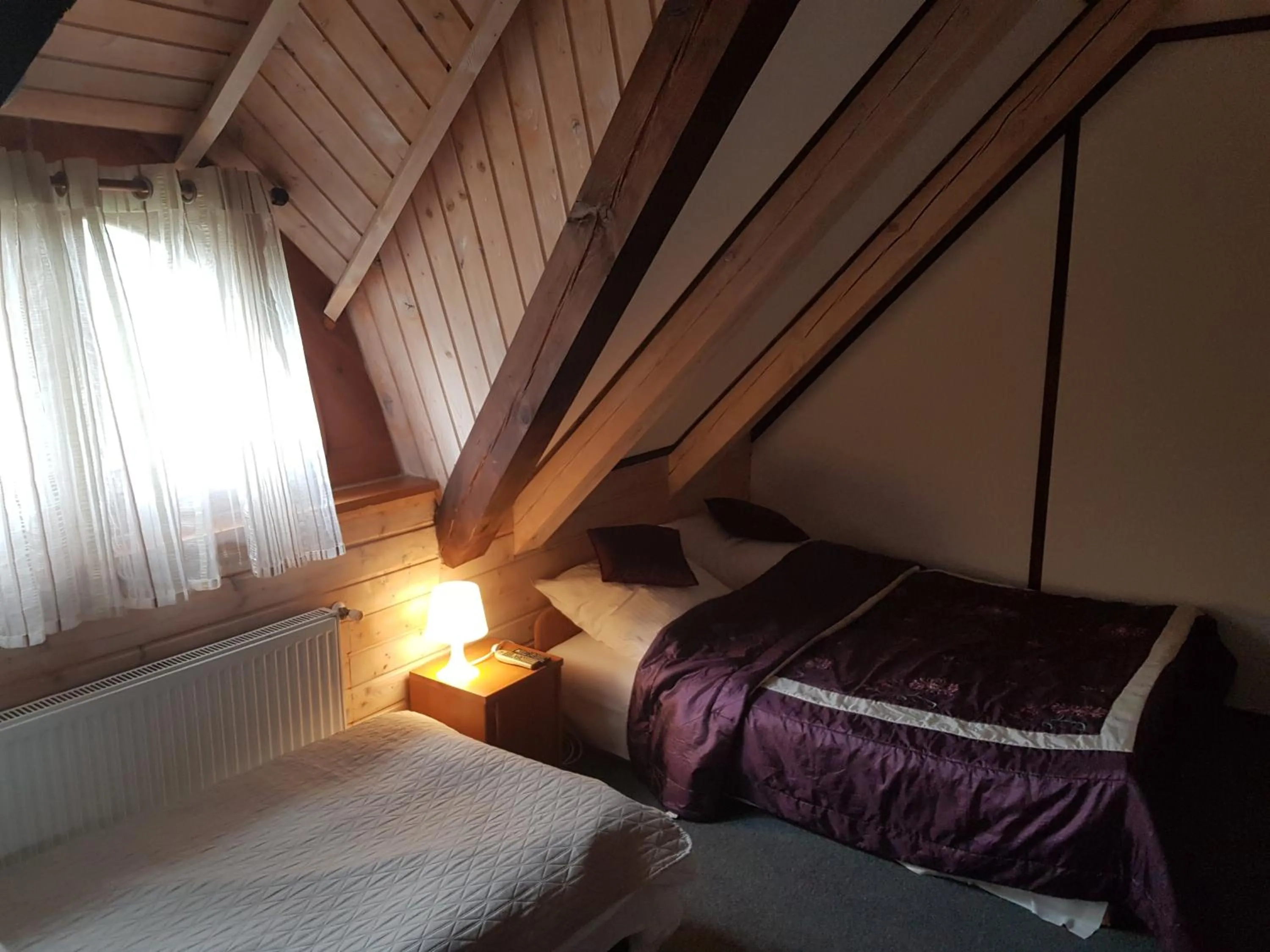 Photo of the whole room, Bed in Jasminum