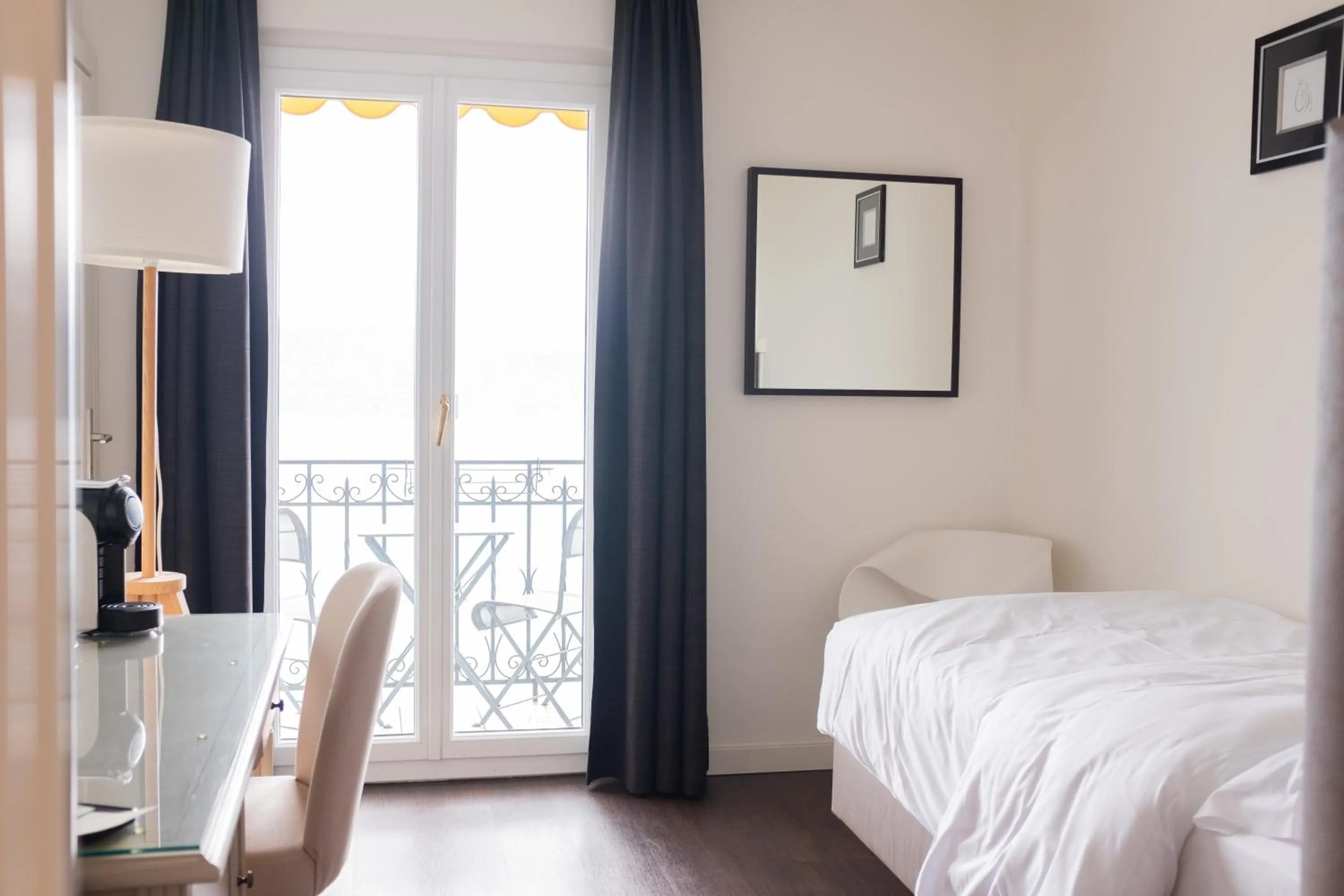 Bed in Baron Tavernier Hotel Restaurant & SPA