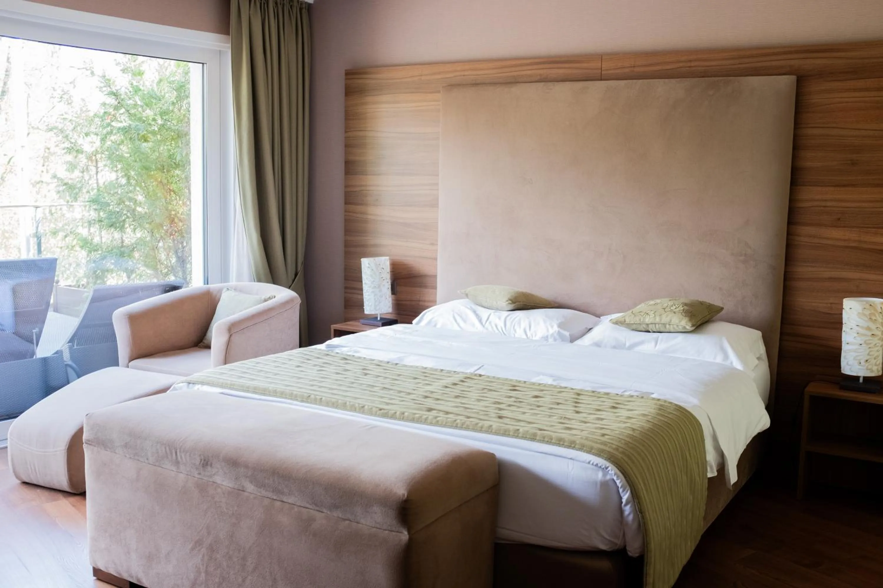 Bed in Baron Tavernier Hotel Restaurant & SPA