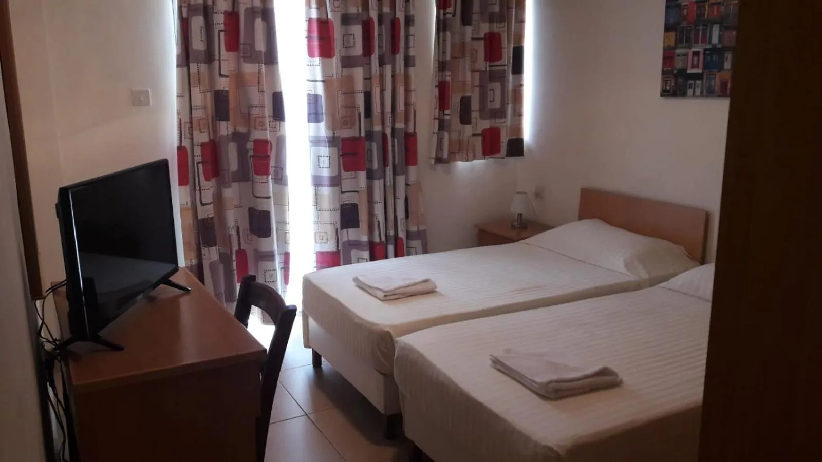 Photo of the whole room, Bed in Tropicana Hotel