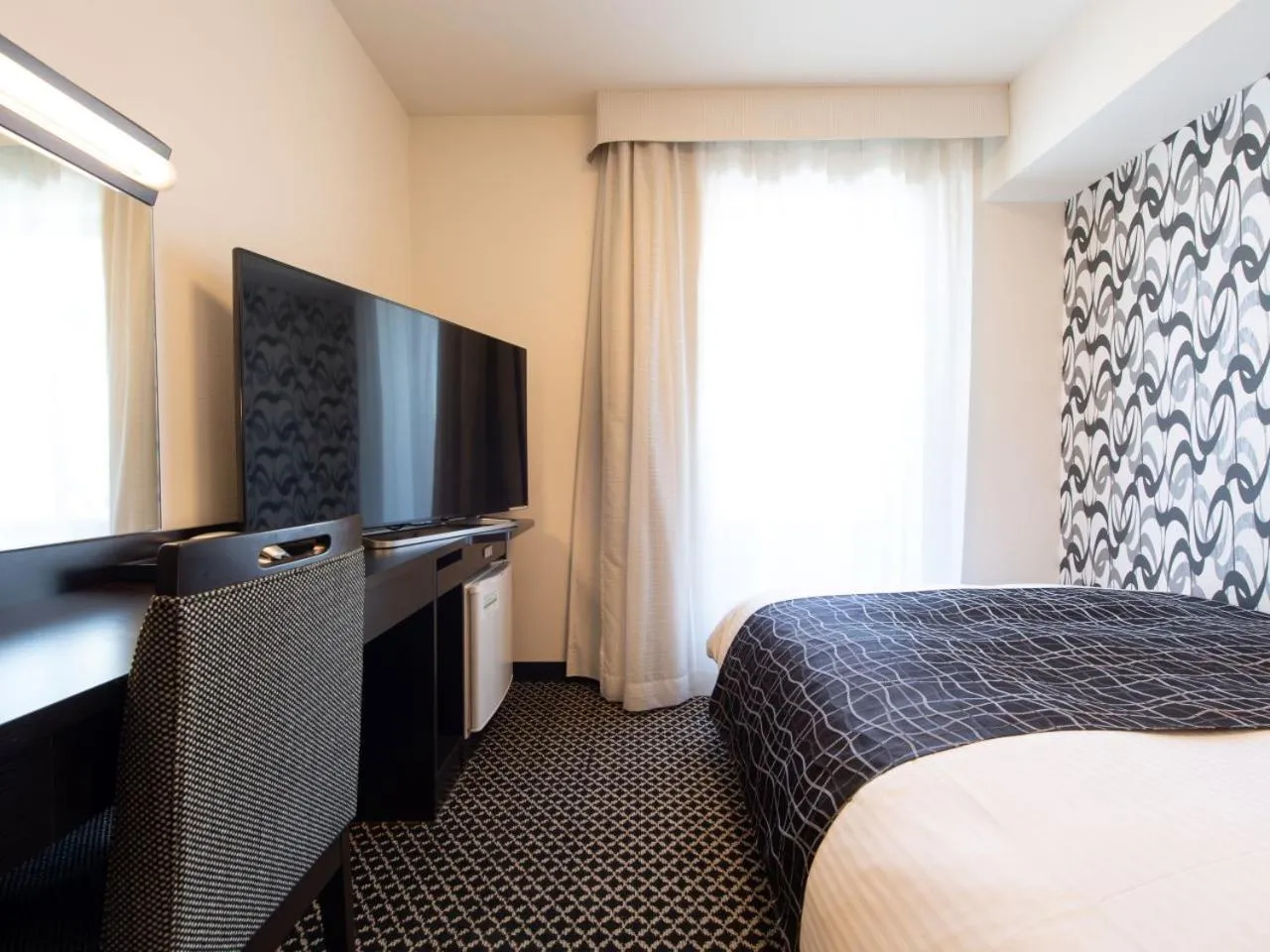 Bed in APA Hotel TKP Tokyo Nishi-Kasai