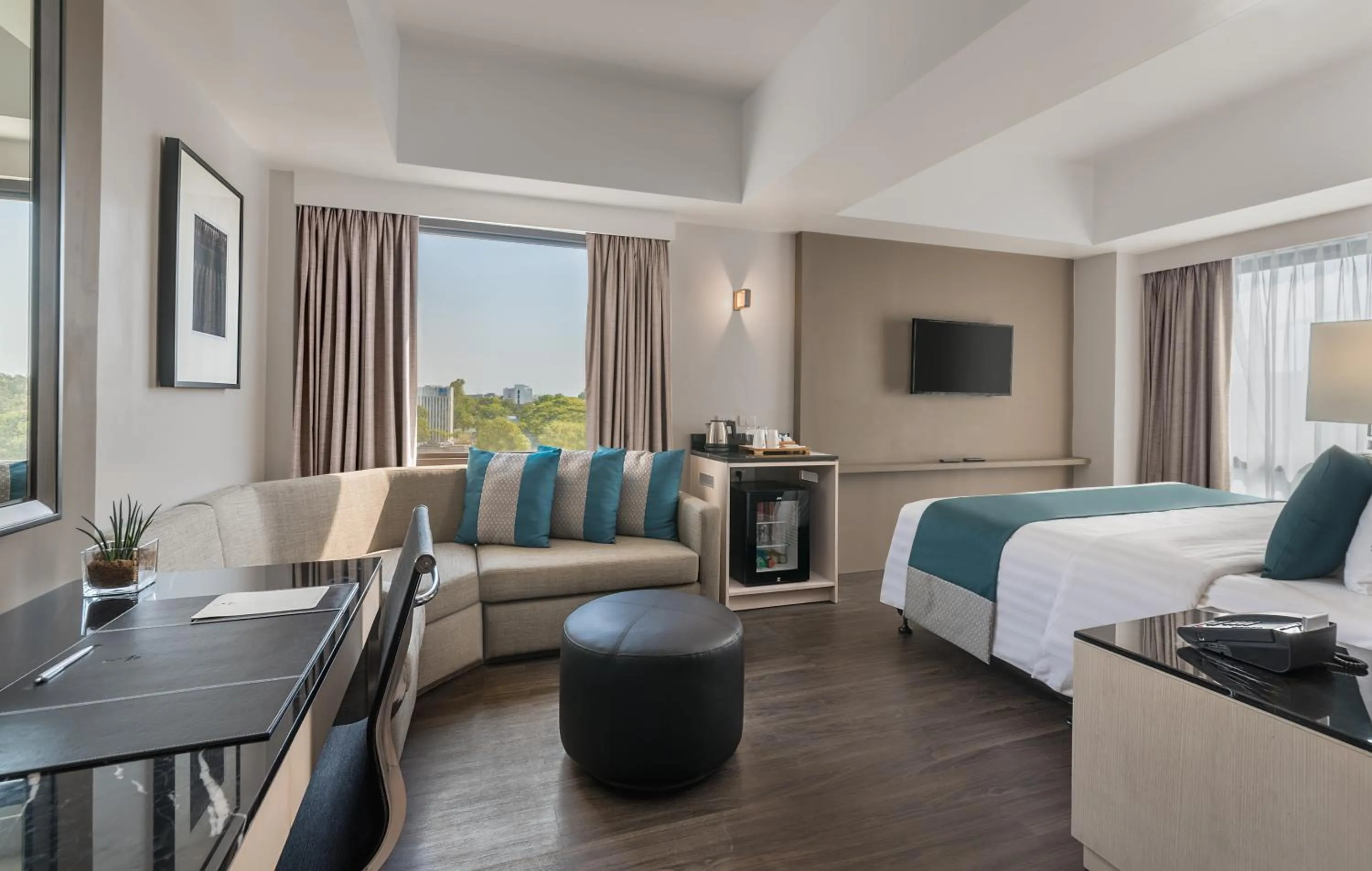 Seating area, Bed in Seda Capitol Central Bacolod City