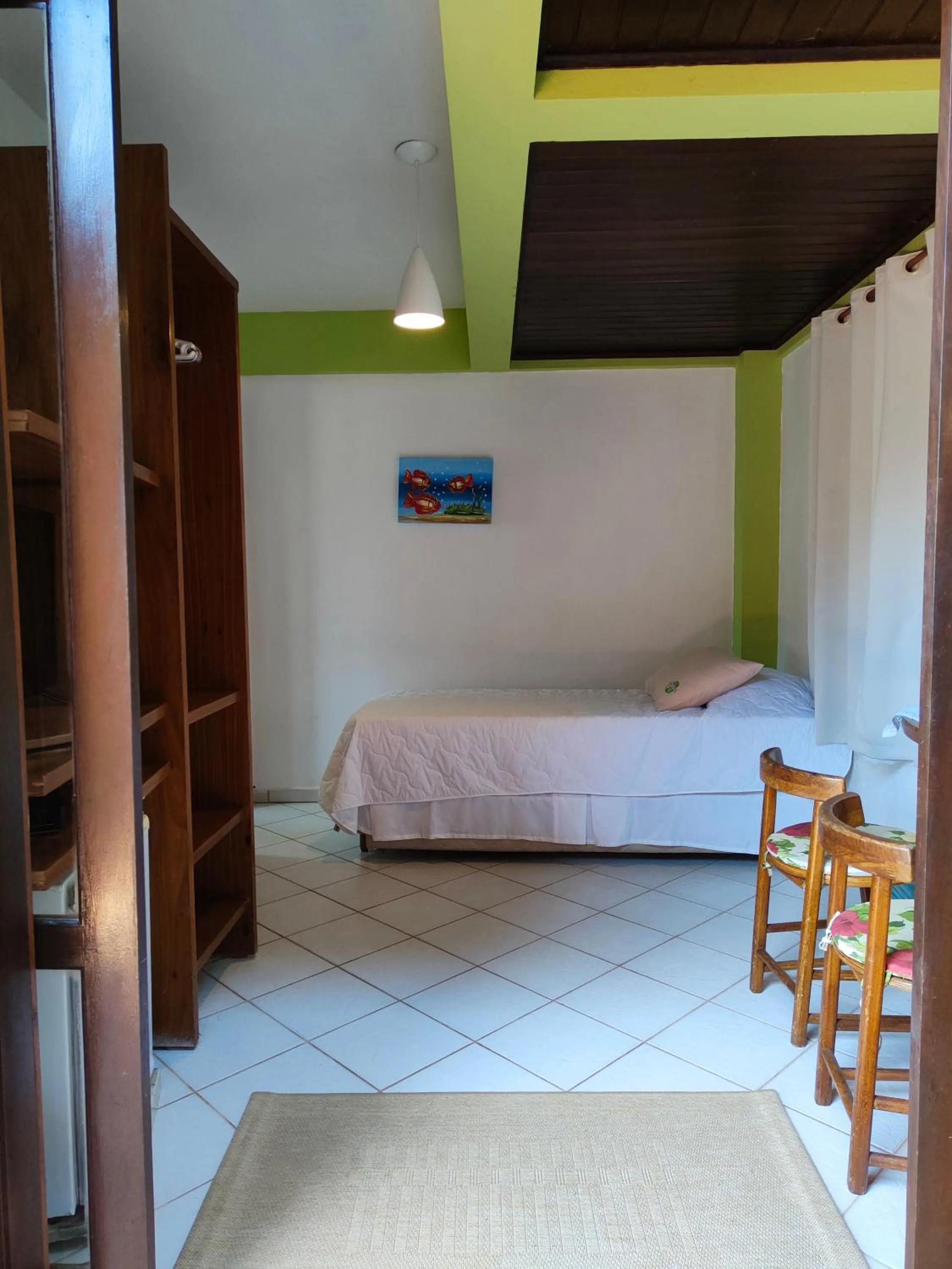 Bed in Pousada Palmeiras