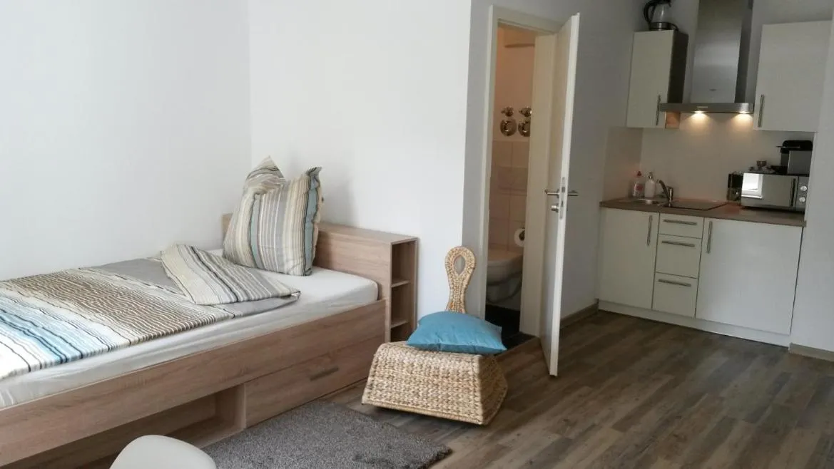 Decorative detail, Bed in Hausner`s Hotel- Studio Apartments