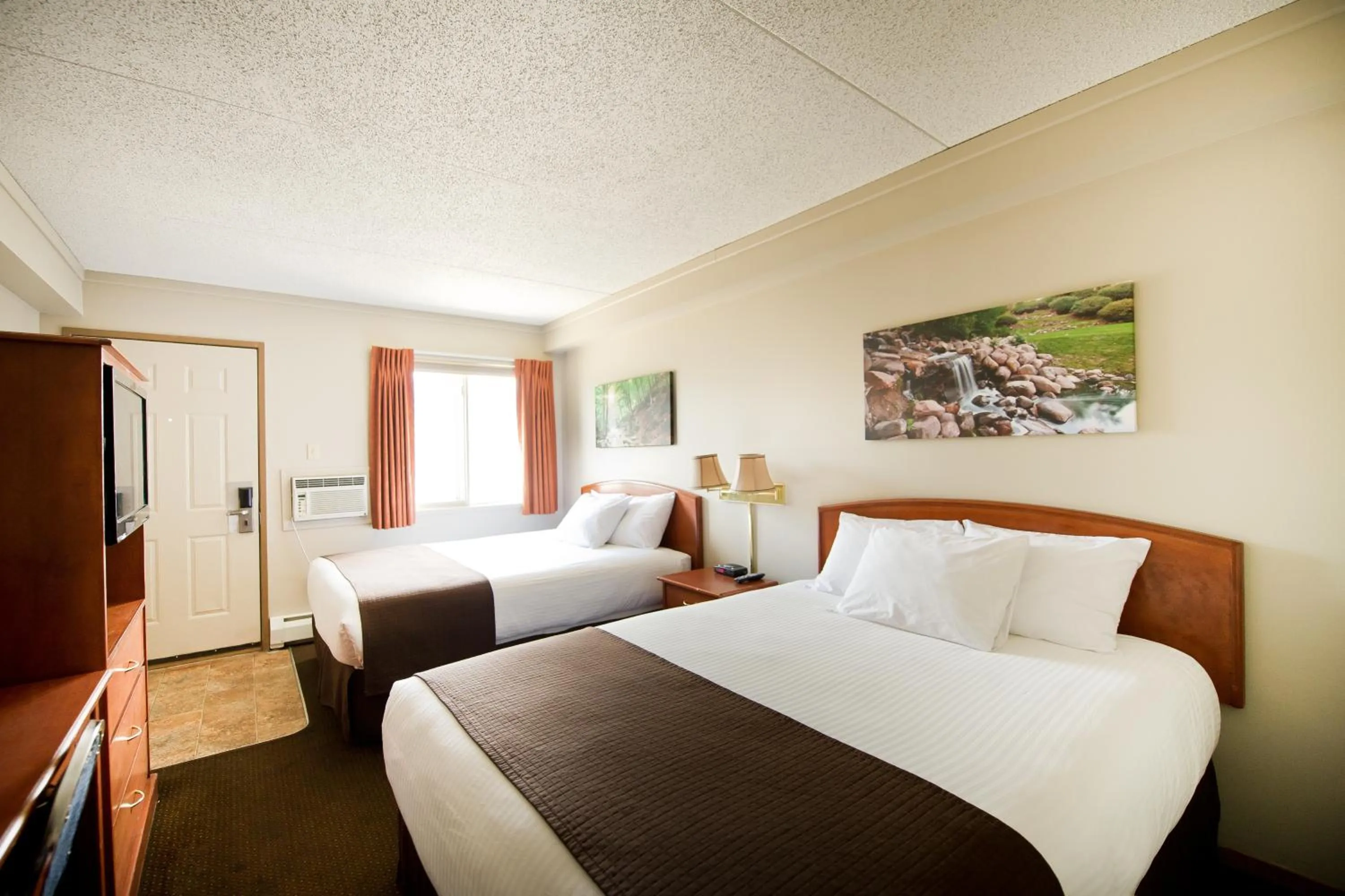 Bed in Riviera Motor Inn