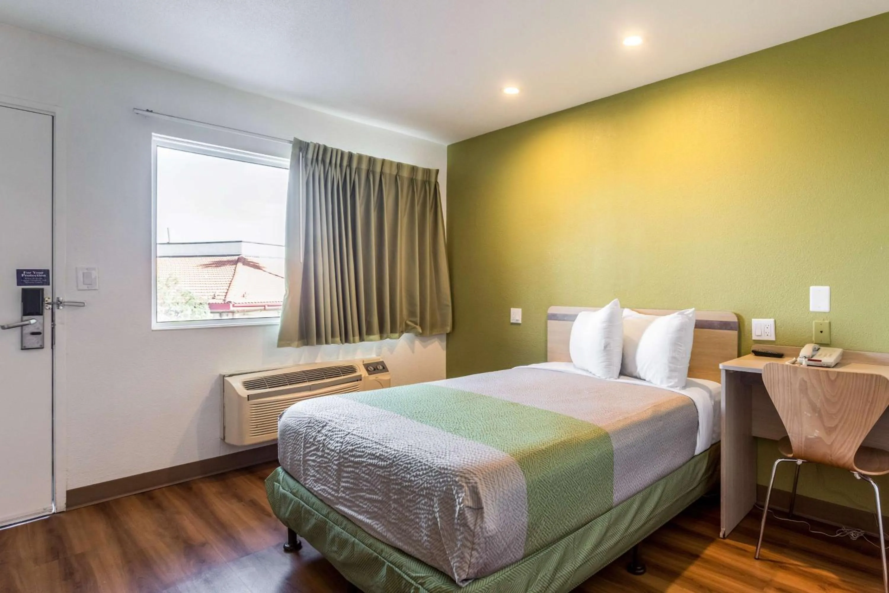 Seating area, Bed in Motel 6-Needles, CA