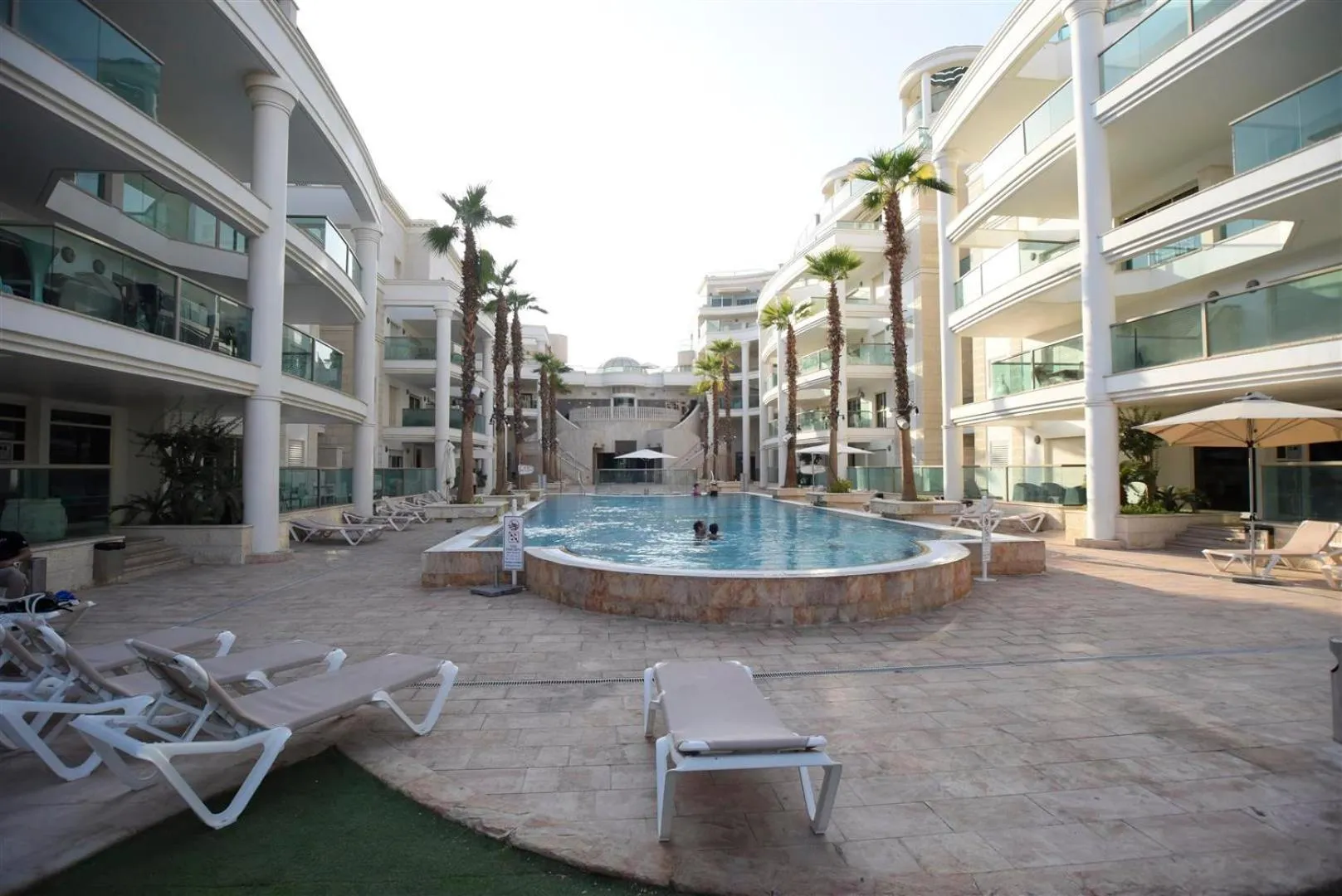 Swimming pool in City Resort Palmore