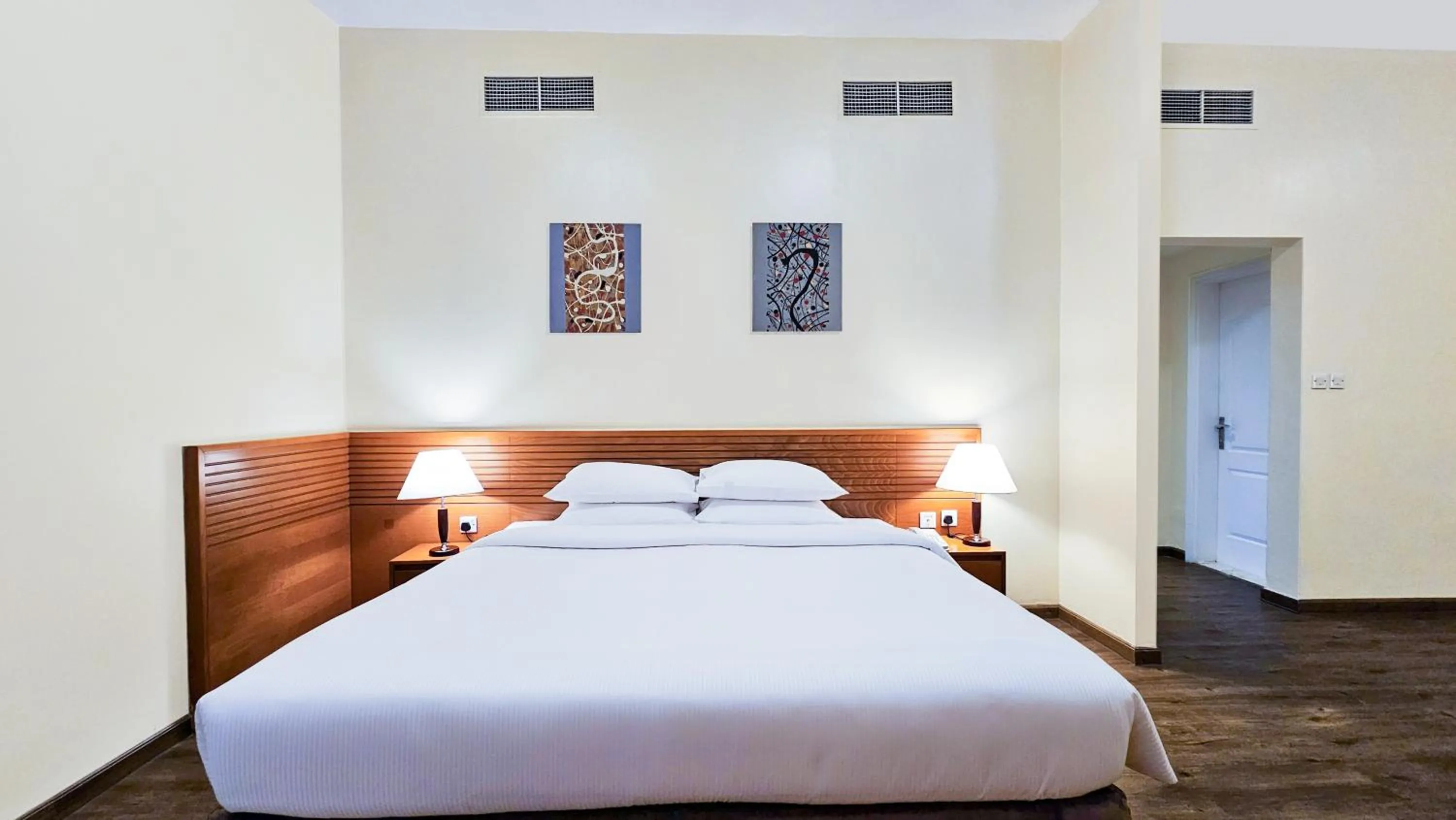 Bed in Ramada Hotel & Suites by Wyndham Ajman