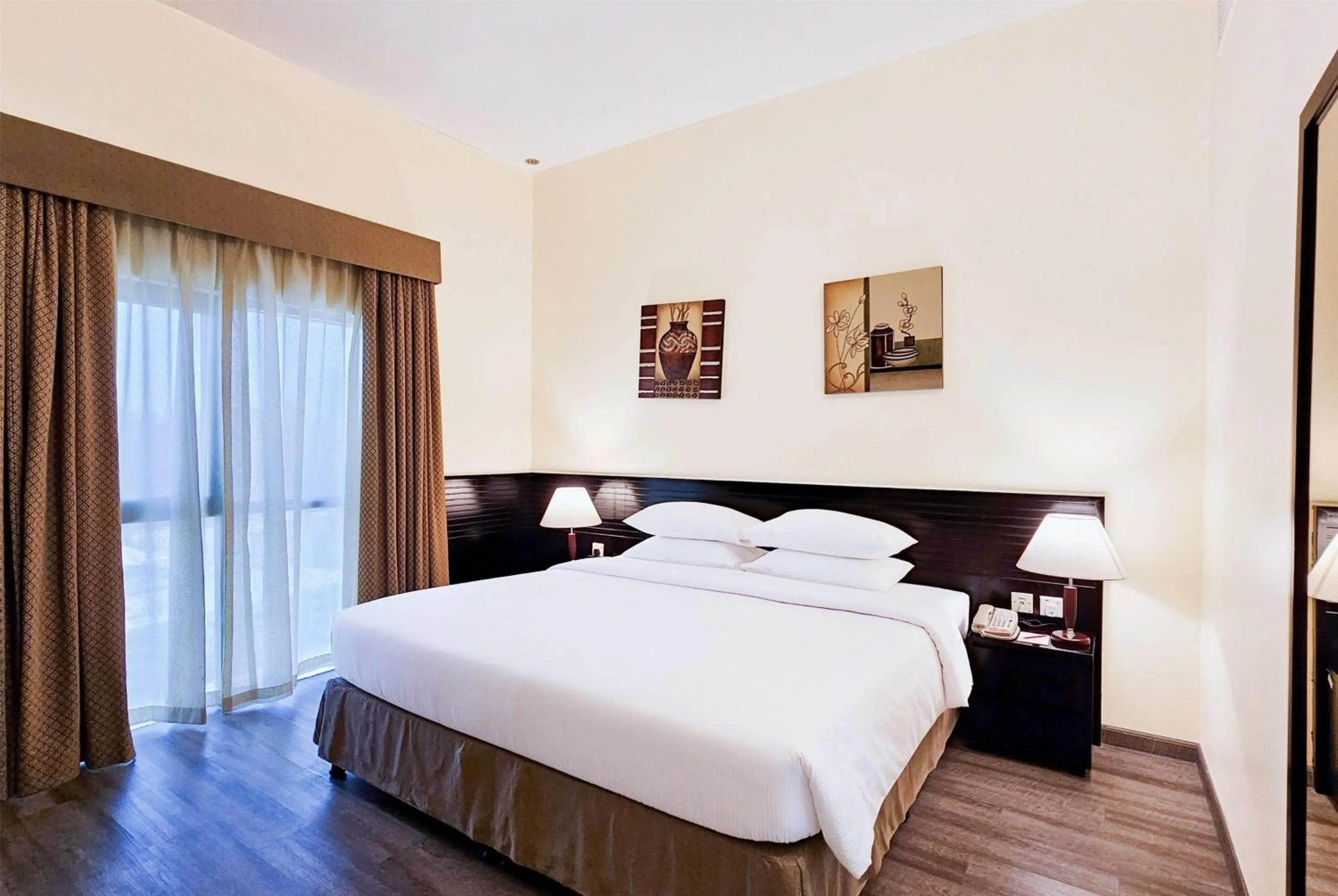 Photo of the whole room, Bed in Ramada Hotel & Suites by Wyndham Ajman
