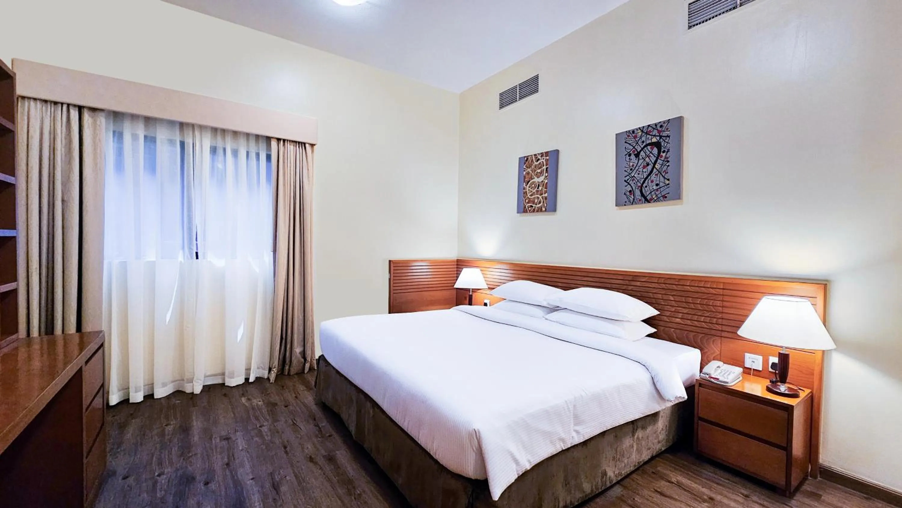 Bed in Ramada Hotel & Suites by Wyndham Ajman