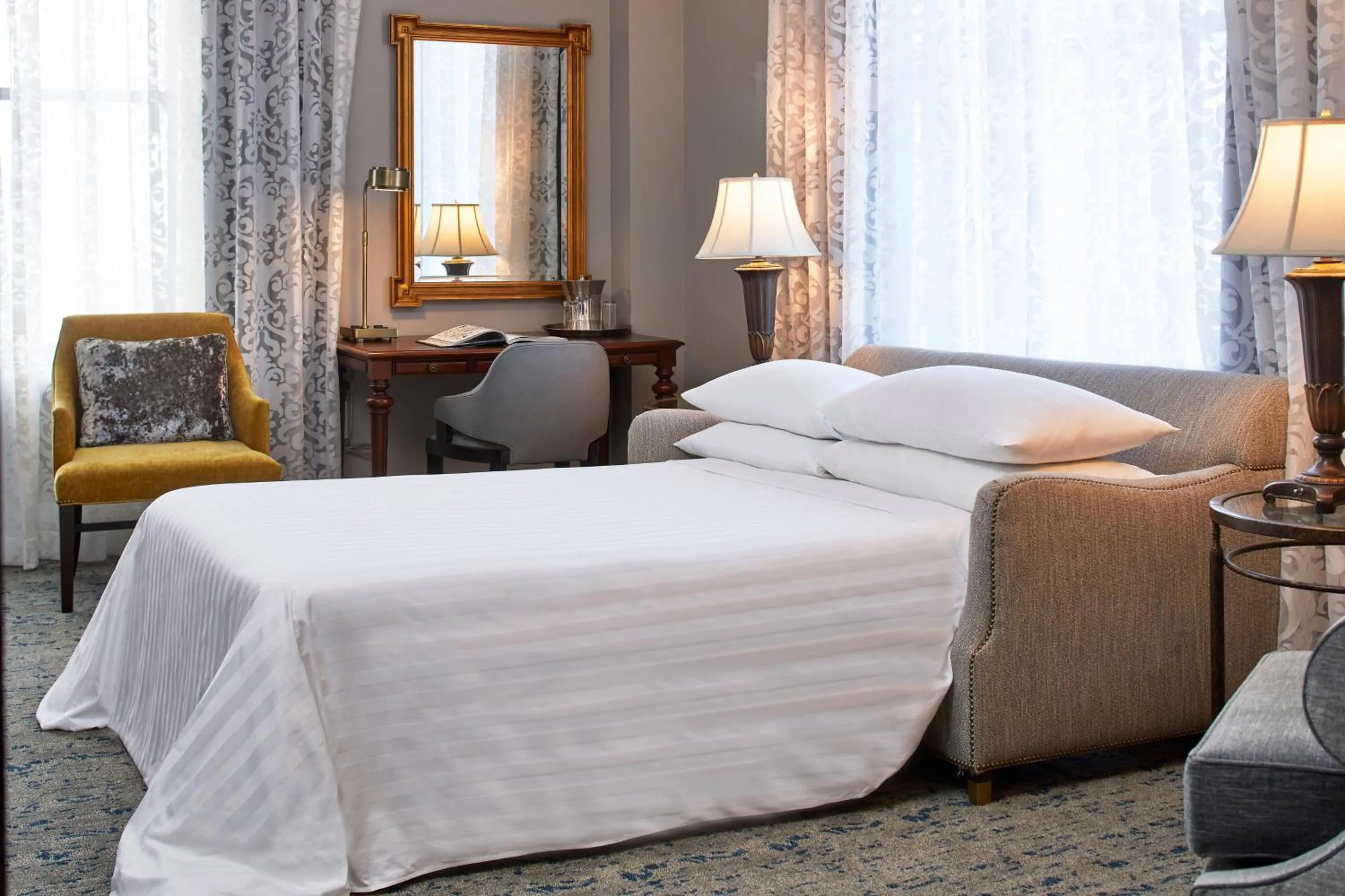 Photo of the whole room, Bed in The Battle House Renaissance Mobile Hotel & Spa