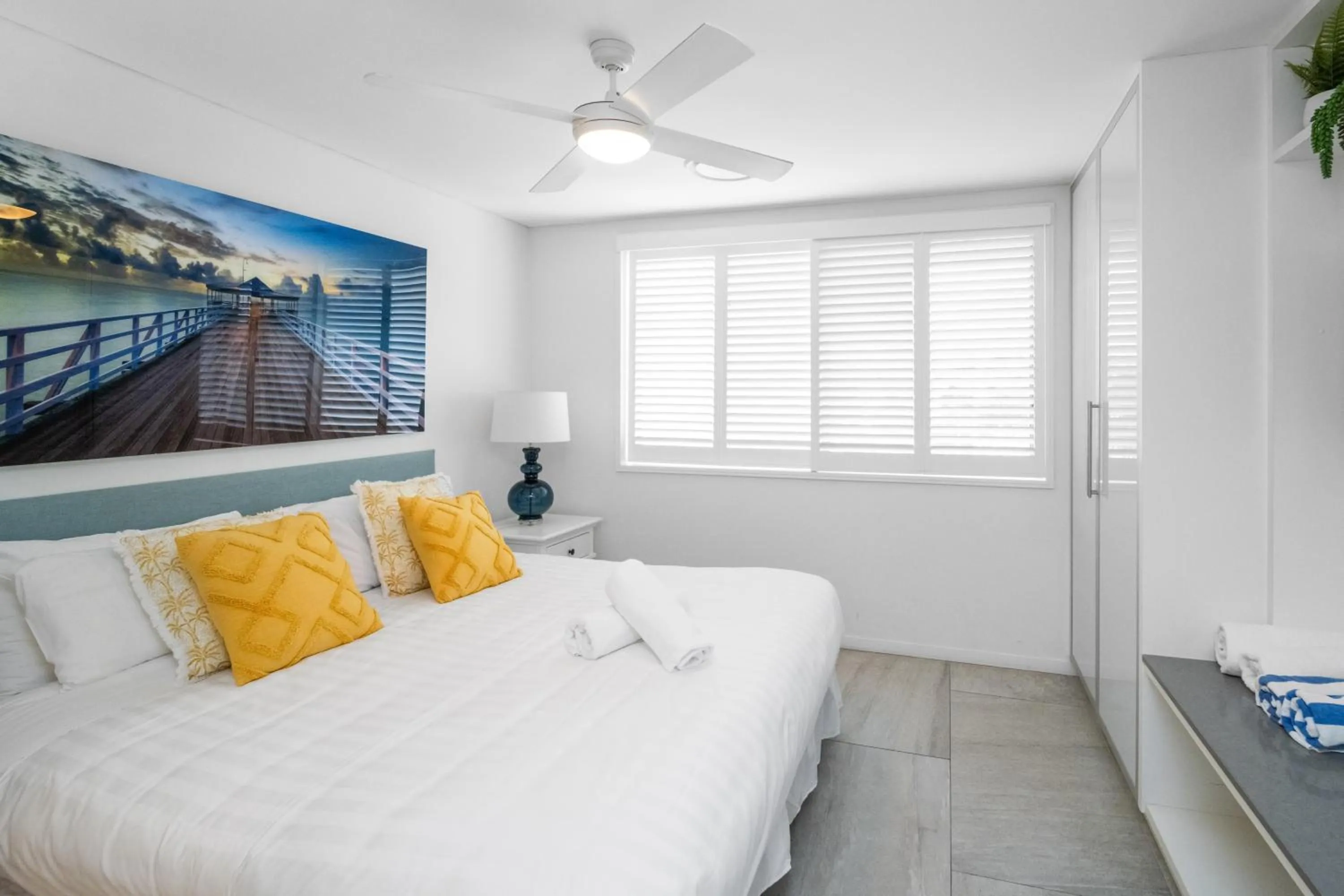 Bed in Bay Royal Apartments