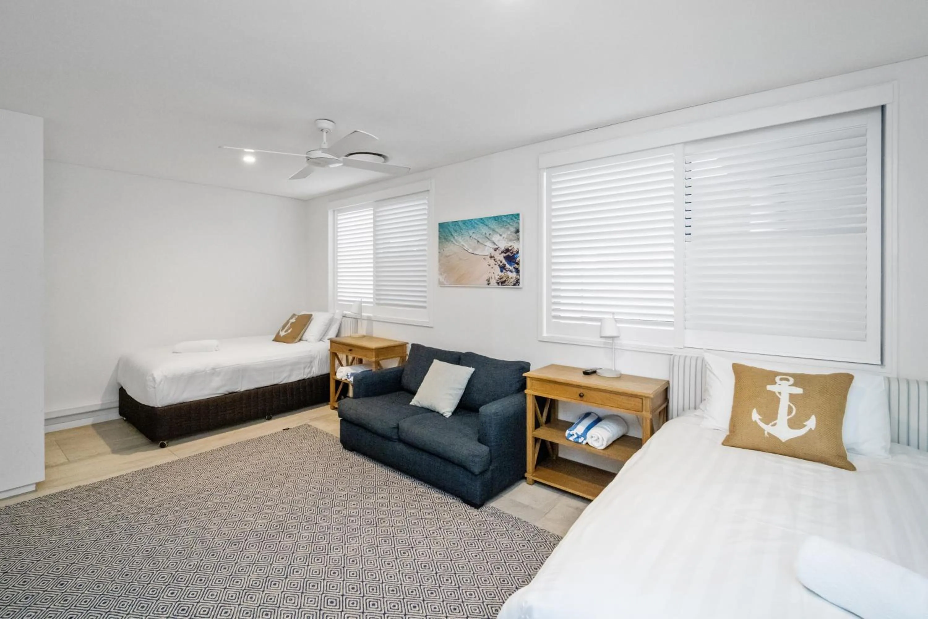 Bed in Bay Royal Apartments