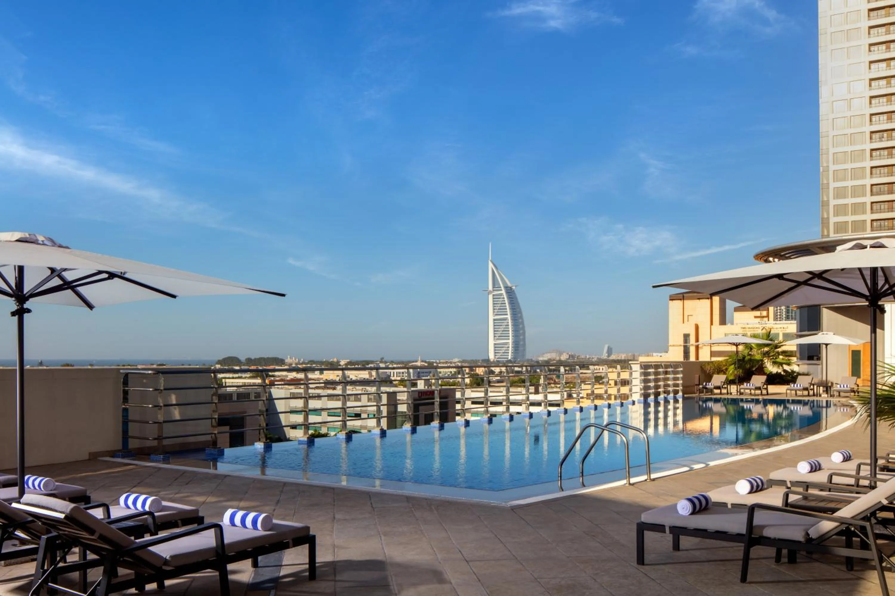 Swimming pool in Staybridge Suites Dubai Internet City by IHG